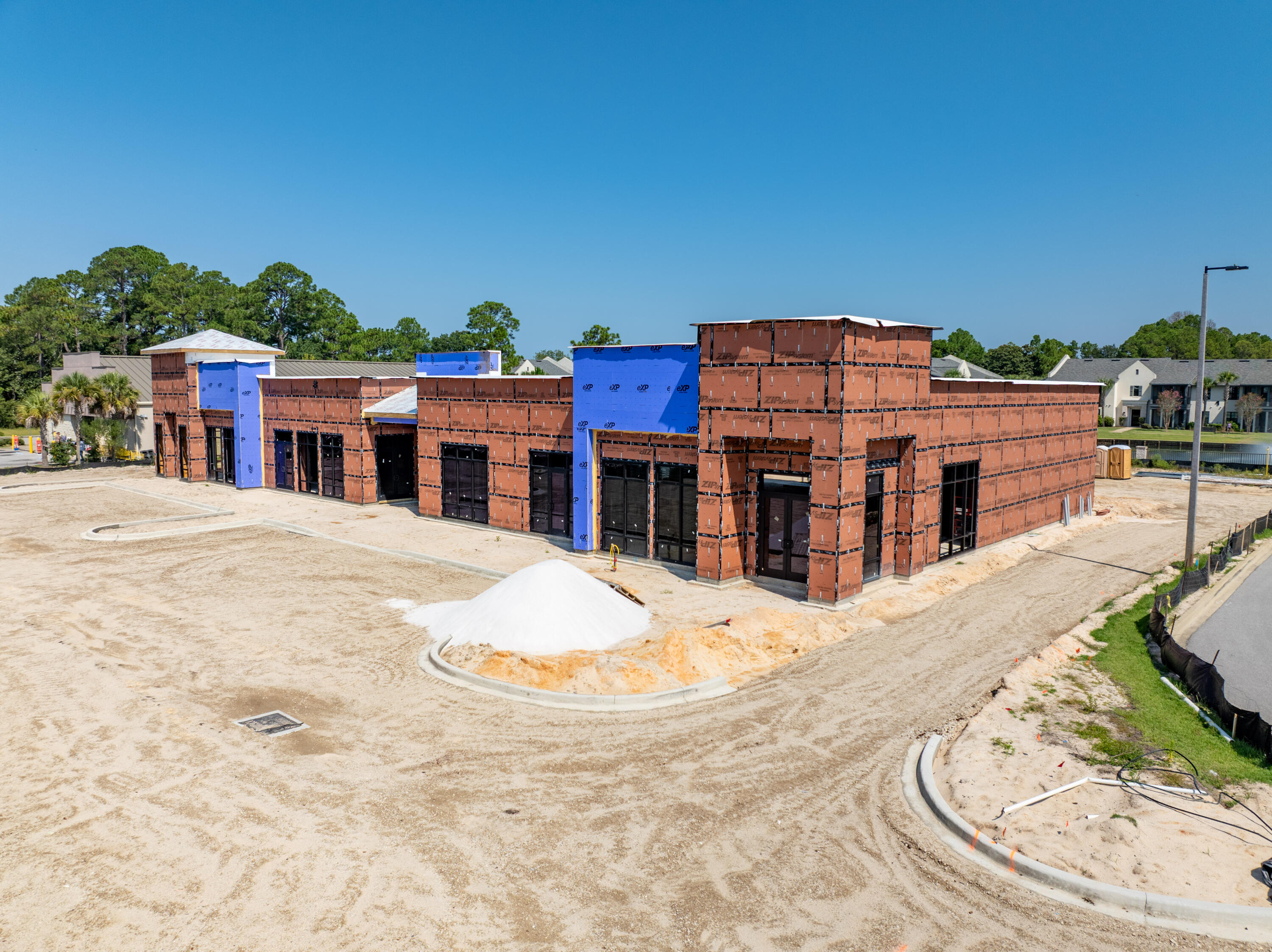 ~11,246 Square Foot Subdividable Building with a Drive-Thru! (listing price involves the anchor space at ~4,000 square feet) 239' of Highway 98 frontage enjoying the benefits of an existing deceleration lane and access to a traffic light! One of the most premier sites located in South Walton County of Santa Rosa Beach, Florida. This 1.5-acre parcel, zoned Village Mixed Use, is identified on the uploaded plat as 'Parcel B' of the mixed-use development known as The Shops of 393. This outparcel commands significant visibility from a traffic count of approximately 45,000 vehicles daily. Please inquire for further details.