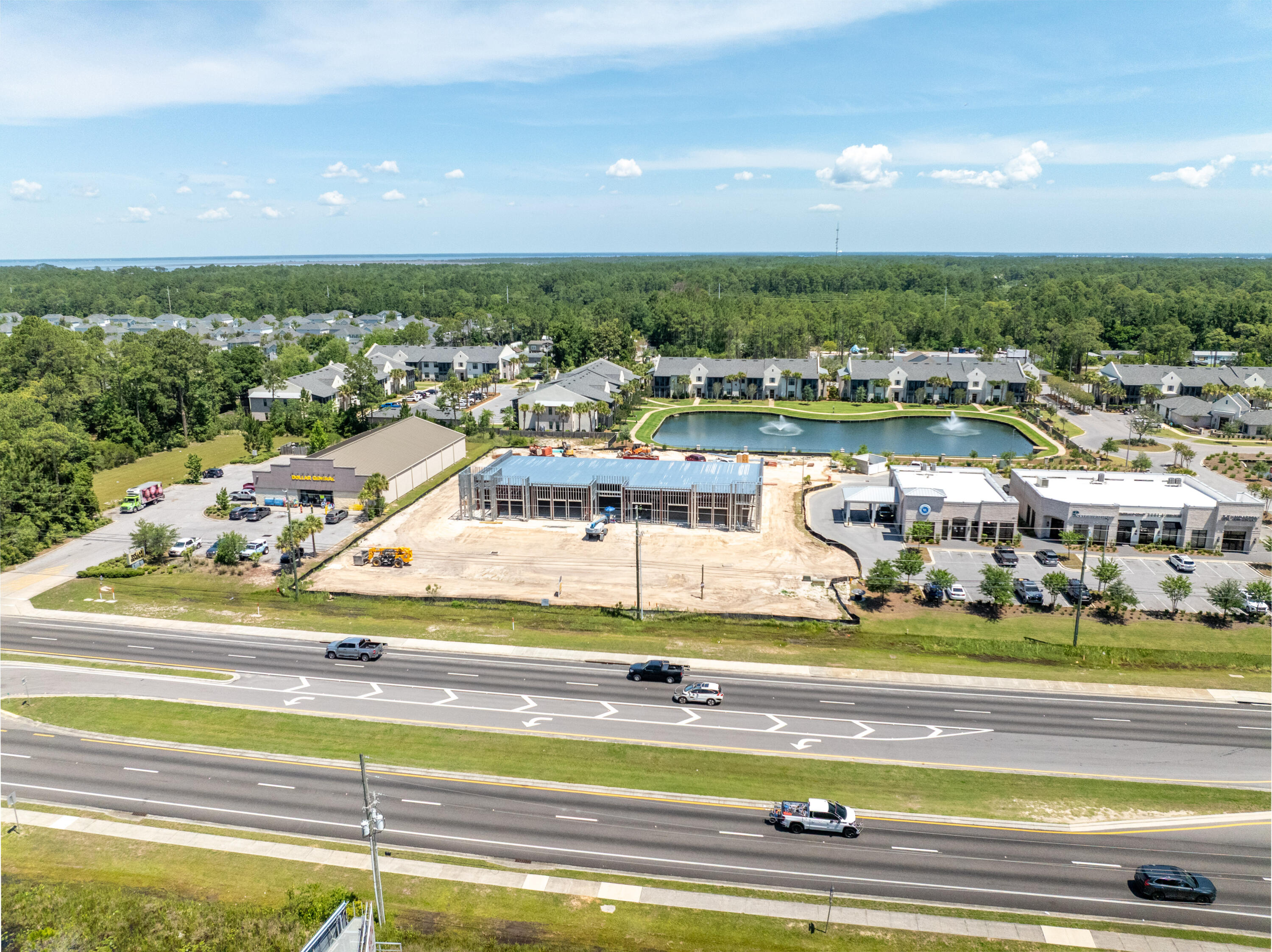 ~11,246 Square Foot Subdividable Building with a Drive-Thru! (listing price involves ~4,000 square feet) 239' of Highway 98 frontage enjoying the benefits of an existing deceleration lane and access to a traffic light! One of the most premier sites located in South Walton County of Santa Rosa Beach, Florida. This 1.5-acre parcel, zoned Village Mixed Use, is identified on the uploaded plat as 'Parcel B' of the mixed-use development known as The Shops of 393. This outparcel commands significant visibility from a traffic count of approximately 45,000 vehicles daily. Please inquire for further details.
