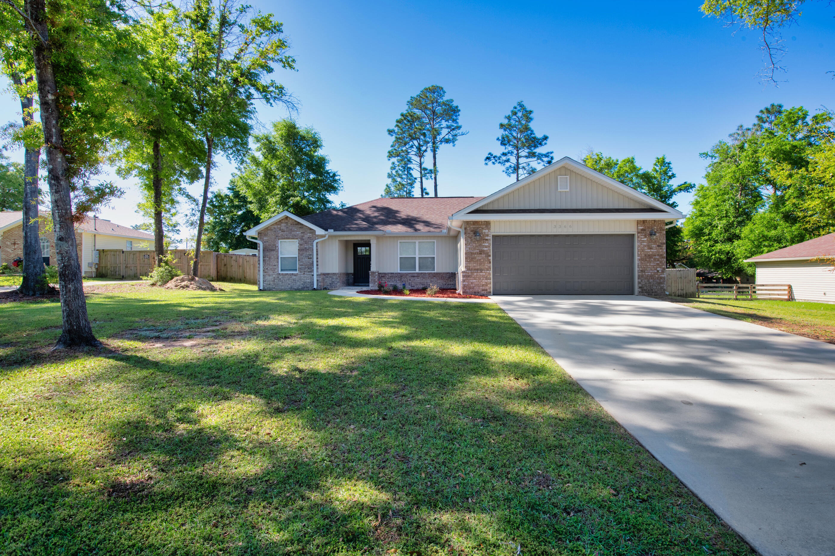 Welcome to your charming 4 bed, 2 bath Craftsman-style home in North Crestview, FL, built in 2018. This modern residence features stainless steel appliances, Allen and Roth laminate flooring, and plush new carpeting in all bedrooms. The septic has been recently inspected and the gutters were installed 3 years ago. Step outside to discover a delightful pergola in the spacious backyard surrounded by a 6ft privacy fence, perfect for outdoor gatherings. With its move-in ready status, this home offers both comfort and convenience for your family's enjoyment.
