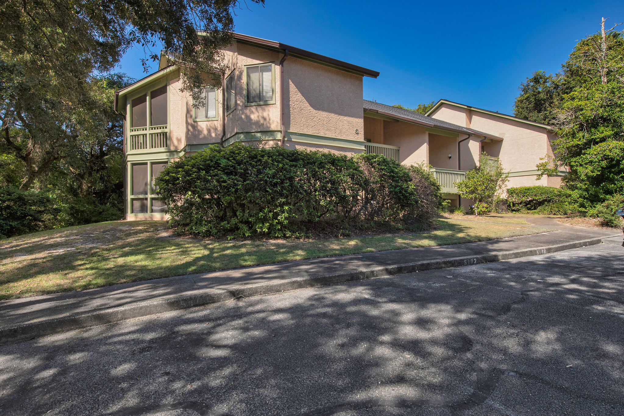 Enjoy a resort-style living investment property! Currently tenant occupied! Bluewater Bay features golf, community pools (membership available), walking trails, and plenty more amenities. This spacious 2-bedroom condo feels bigger than expected and includes a private screened patio for relaxing outdoors. With its open, light-filled layout, this home is move-in ready. Don't wait--schedule a showing today!