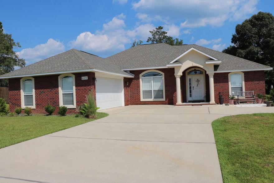 Beautiful All Brick home located in the Carnegie Hills Subdivision. This lovely home has a open kitchen with granite counter tops, tile flooring, upgraded cabinets and stainless steel appliances. The master bedroom has raised ceilings with crown molding. The master bathroom offers a double vanity, garden tub, separate shower and 2 walk in closets. The home has a split floor plan which has the 2nd and 3rd bedroom located on their own wing of the home. The home also has a formal dining room, breakfast nook, and a spacious living room. An 18x12 Florida room can have many functions depending on your needs. The backyard has trees for shade and plenty of outdoor living space. This home also comes with a built in sprinkler system. Don't miss out ! Come take a look for yourself.