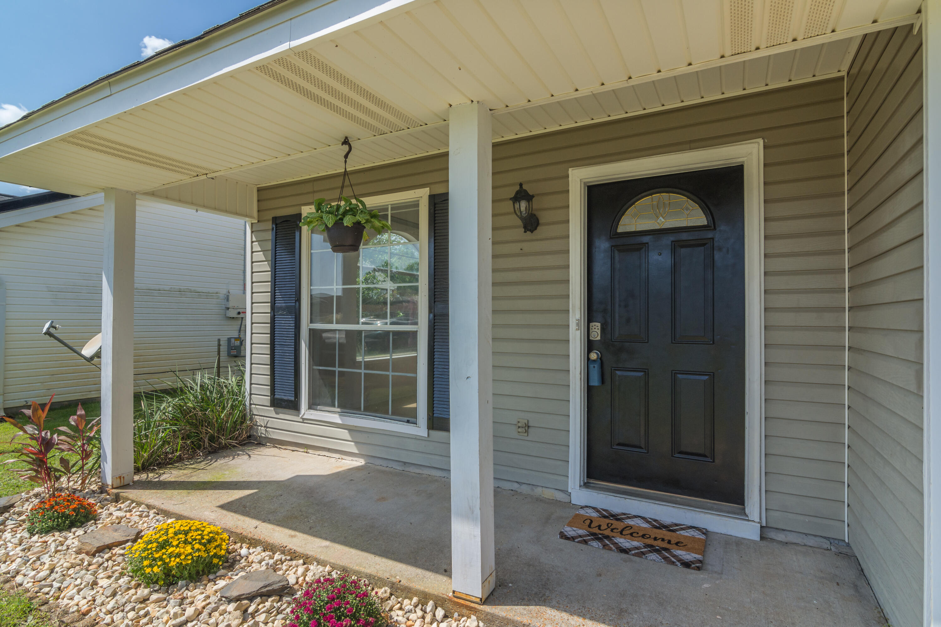 Back on the market - no fault of the seller. Come see it today!! Won't last long! Check out this super cute home in the heart of Navarre! Just 4.4 miles from the beach and half mile from the new neighborhood market makes shopping a breeze. The kitchen features quartz counters, tiled backsplash, oversized sink with pull down sprayer, eat in kitchen/dining area and tiled floors. The living area has a fabulous vaulted ceiling and large arched window for lots of natural light, tiled floors. Two bedrooms are on the first floor have luxury vinyl plank flooring and ample closets. The master suite is the entire second floor - double closets and the vanity is topped with beautiful quartz.