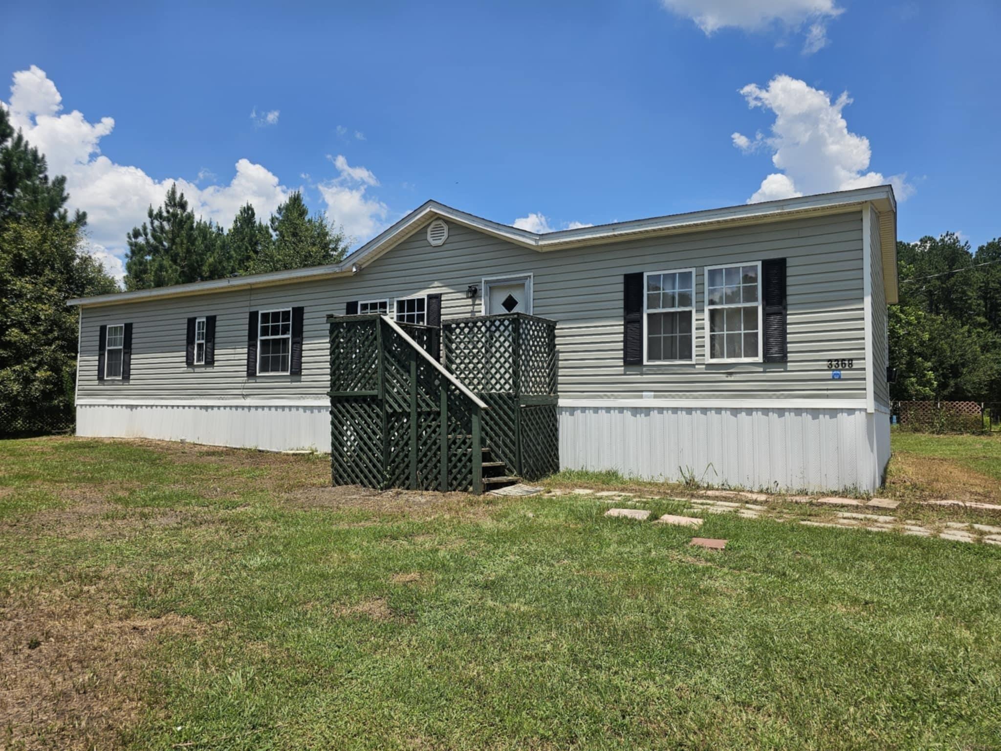 Located just outside the City of Lockhart, AL this 4BR, 2BA is priced PERFECT. Home has a large open floor plan with living room, dining room, and kitchen connecting that is perfect for a large family to enjoy together. The home has a great master suite with a large closest, separate tub and shower as well as double vanity and is handicap accessible. The split floor plan offers 3 additional bedrooms and comes with a fenced yard, detached carport, new siding on the home and the roof is just 3 years old! Looking for a great payment and tired of paying rent - this is your home! Home also includes washer/dryer combo. Call today to view this priced right home on 0.73 acres!