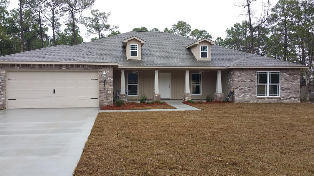 This Glorious Like-NEW home built end of 2017-located in the Heart of Navarre just 10 minutes from Hurlburt Field AFB, & minutes away from the Beautiful pristine Navarre Beach- 4 BDR 2 BTH 2095 sq ft- Brick/Siding Home residing on a spacious .57 Acre lot (.25 acre is Complete Privacy Fenced Backyard) -GRANITE Tops in Kitchen & Baths- Wide Plank Tile Flooring throughout, carpet in Bedrooms -All Kitchen Appliances are 2017 Stainless Steel -Whirlpool- Washer & Dryer do NOT convey, but negotiable with an acceptable offer. Garage Deep Freezer & Refrigerator do NOT convey. Vaulted Ceilings in Main LV Room/Kitchen - Split /Open Floor Plan- Bonus Room Office/Playroom- Formal Dining Room open to Kitchen and a Full Breakfast Bar w/Pendant Lighting. Architectural Shingled, Low E Glass Vinyl Windows