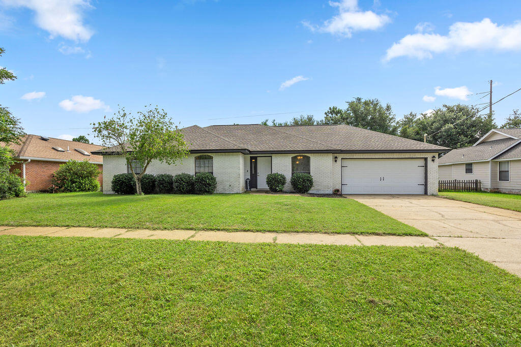 Welcome to Fox Den Villages in east Navarre, where this well-maintained ranch-style home blends everyday comfort with recent upgrades. Offering 3 bedrooms, 2 baths, and 1,601 square feet, the semi-open floorplan features a spacious galley kitchen, engineered hardwood floors in the living room and bedrooms, and tile in the kitchen and baths for easy care.A versatile flex room adds value and options; it can serve as a dining room, home office, playroom, or even be converted into a true fourth bedroom to fit your needs.What's new? This home now includes a full set of new appliances (stove, refrigerator, washer, and dryer), a new HVAC system, and a new 40-gallon water heater in the garage; all updates that provide lasting peace of mind.Out back, you'll find a private yard with an open deck and a storage shed, perfect for relaxing or entertaining. The quarter-acre lot and two-car garage round out the property's appeal.
Currently tenant-occupied and respectfully listed with photos from a prior listing, the home remains in excellent condition and is ready for a new owner. Its location makes commuting a breeze, just minutes to Hurlburt Field and about a half-hour to Eglin AFB.
