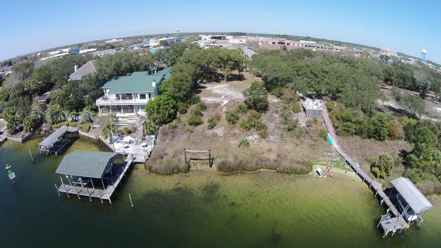 Build your dream home and boat dock on the beautiful Destin Harbor. Enjoy the convenience of the Harbor lifestyle! This lot has 51 feet of width and water frontage. The lot is conveniently located in the middle of the Destin Harbor at 28 feet of elevation. Single Family Residential only. The adjacent Lot is also available for the same price from the same seller. This would give a total of 102 feet of width and water frontage.