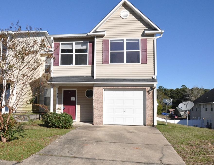 REO property. This spacious townhome has the potential to be either a great home or investment opportunity. Home contains four bedrooms, two and a half bathrooms, and a one car garage. A large living area is located on the first floor, which includes living room, dining room, and kitchen. A half bathroom is located on the first floor as well. The location is ideal as it is centrally located and close to shopping.