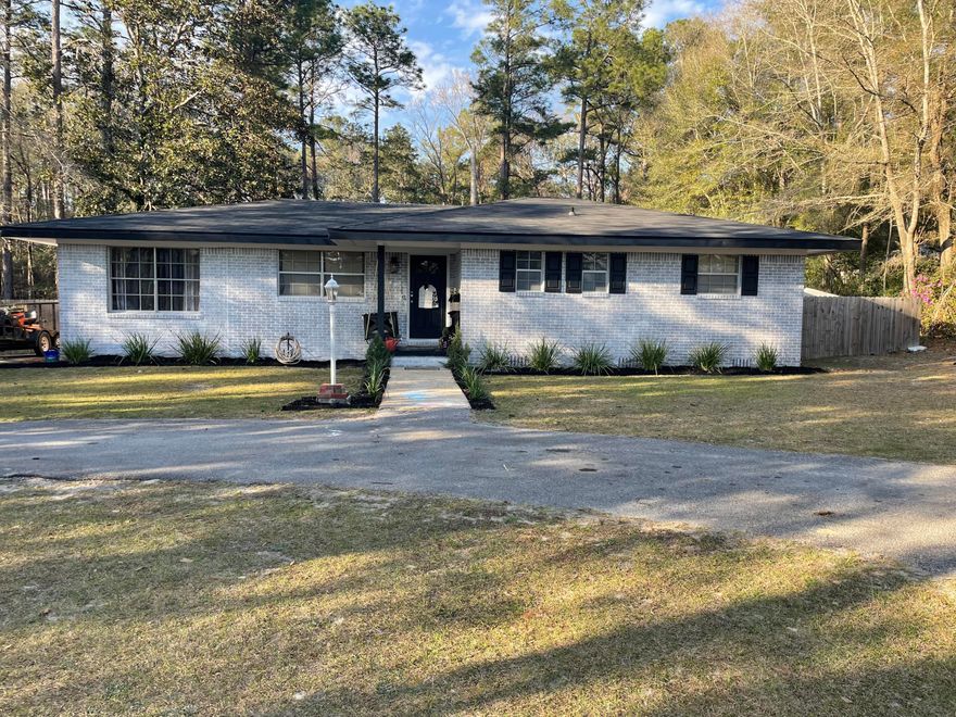 Located just 30 min from the white sandy beach of the Gulf.  This wonderful family home is in one of the most desirable neighborhoods in Defuniak Springs.  This home has original hardwood floors along with vinyl floors throughout.  There is a new well (2020), Septic (2019) and HVAC (2018).  New roof in 2018. The interior and the exterior of the home was recently completely repainted.  Kitchen has granite counter tops and a wonderful open dining area adjacent to the kitchen.  Just off the living area is a 20x12 den currently used as a play/office area, however could have many uses, a formal dining room is one. Wonderful entirely fenced in back yard. There is a creek at the back edge of the property and a great fishing pond across the street.