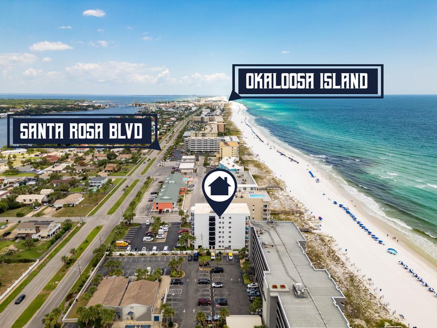 Mesmerizing is a great way to describe how you will feel in this coastal 4th floor unit overlooking the heated pool and breathtaking views from your oversized 8'x 28' balcony.  A total of 20 units with 3 units to each floor makes this a low density complex.  The exterior has gone through a complete transformation including: awnings, painted exterior  and new patio furniture around the pool.  Plus,  gated parking lot for  security.This is not a rental unit.  Original owners who enjoy sharing with friends and family members.  As you enter the unit, a long hallway opens up to the living room. dining area and kitchen.  The walls are painted a  warm color The floor to ceiling sliding glass doors with plantation shutters leads out to the expansive balcony where  you can enjoy watching t dolphins play. The spacious primary  bedroom has a walk in closet while the ensuite is complete with a jacuzzi tub, separate shower and vanity. An additional bedroom and full size bathroom with access from the bedroom or hallway.  A laundry room with a stackable full-size washer and dryer...no need to hunt for a laundromat.  Water heater replaced in 2022. The owner's closet has  ample room for all your personal items.  A wooden walk way leads out to the beach.  There are restrooms and a shower located at the pool area for your convenience.   Don't pass up the opportunity to view this beautiful unit and create many memories. 