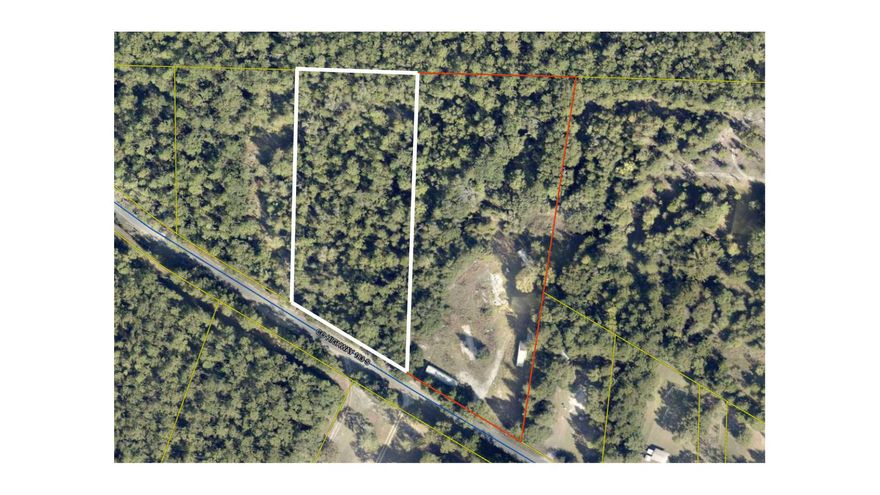 Looking for the perfect spot to build your dream home or weekend getaway? Check out this beautiful 2-acre piece of land located on a paved road. It's partially cleared, so you've got open space to work with, but still has plenty of mature trees for privacy and shade.The power is already at the lot, and the water tap is paid, so a lot of the prep work is already done for you. It's the best of both worlds--quiet country living with room to spread out, but still close enough to town for all your everyday needs.Whether you want to build, garden, or just have a quiet spot to unwind, this property has tons of potential. This property is zoned rural village.