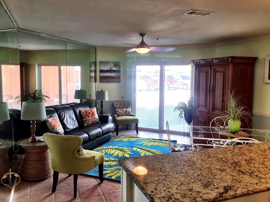 The beach is calling! And this freshly remodeled ground floor condo is the perfect place to enjoy it! The kitchen features new cabinetry, light colored granite counter tops, & new stainless appliances. The bathroom has a brand new custom tile shower, and a new granite top vanity. It's professionally decorated, and comes fully turnkey to be your new beach getaway! This condo will be a rental machine with upwards of $25,000 in rental potential! Gulfview condos has its own private beach with gated access as well as 2 pools and a hot tub which are just outside the front door of the unit.