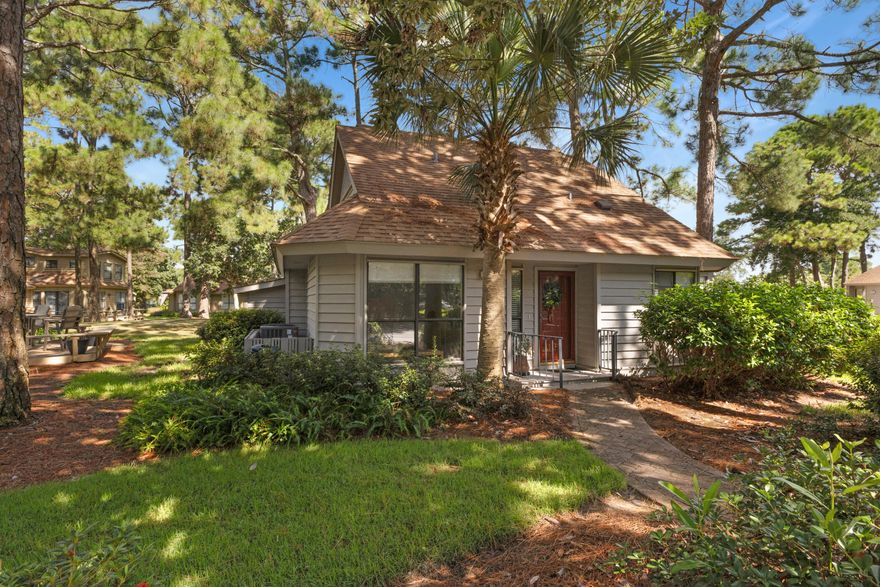 Charming Cottage in the Fairways of Sandestin Golf & Beach Resort!! 1,777 sq feet, beautiful Bay Views!Tucked away on a peaceful wooded corner lot, this rare Fairways cottage offers a perfect blend of privacy and resort living. Located just off the 8th tee box of the Links Golf Course, the home's spacious screened porch and deck provide beautiful views of the fairway as it stretches toward the Choctawhatchee Bay. In the evenings, you'll be treated to the most spectacular bay sunsets. Inside, the 3-bedroom, 3-bath layout has been thoughtfully maintained by its original owners. Previous updates include all-new plumbing, a roof replacement in 2016, HVAC in 2013, and a master bath renovation in 2015. Ample interior storage plus an additional outdoor storage room make it easy to keep everything from bikes to beach gear organized.

A short golf cart or car ride takes you to all of Sandestin's incredible amenities, including pristine beaches, championship golf, world-class dining, shopping, and entertainment. This is a rare opportunity to own a beautifully kept home in one of the area's most desirable gated golf course communities.

Fairways owners enjoy access to the two heated SOA pools: One across from Linkside Village on Audubon Drive (Currently Under Construction) and the newly constructed Phil Hummel Aquatic Center centrally located at the Baytowne Ave Traffic Circle.

As an introduction to the Sandestin lifestyle, we invite our new owners to explore amenities that make Sandestin special. The listing brokerage and seller(s) are presenting the buyer(s) of this property with (2) 90-minute rounds of Tennis court time, a golf foursome at one of our three championship courses, and a round of golf for up to four (4) players at the unrivaled Burnt Pine Golf Club.

Sandestin Golf and Beach Resort features more than seven miles of beaches and pristine bay front, four championship golf courses, 15 world-class tennis courts, a 226-slip marina, a fitness center, spa and celebrity chef dining. Shop, dine and play at the charming pedestrian village, The Village of Baytowne Wharf and more. Inside the gates of the resort, residents enjoy a balanced lifestyle of high-class living, spanning the 2,400 acres from the beach to the bay. Everything within the gates of the resort is accessible by golf cart or bicycle. The entire resort is interconnected by miles of pedestrian, bike and golf cart paths that weave through groves of live oaks, meandering past natural lagoons, fountains, man-made lakes, and meticulously landscaped fairways.