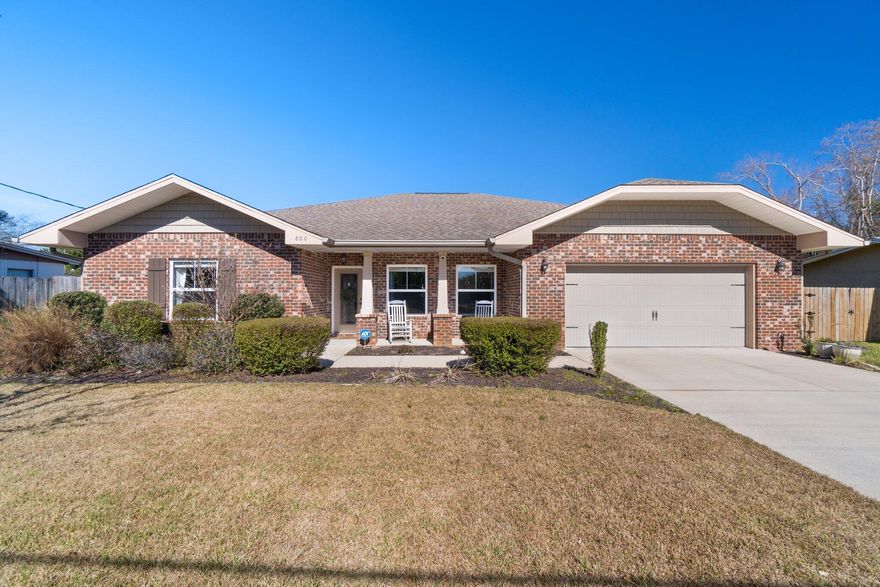 Welcome Home to this Craftsman style home with hand scraped hardwood floors, crown molding,tall 10-foot ceilings, spacious bedrooms and plenty of natural light.The kitchen has all the bells and whistles you could dream of, from a commercial grade fridge to granite to maple cabinets. This is a place where memories and warmth take shape.The master suite has 2 walk in closets, dual vanity sinks, a spacious shower, and even a luxurious whirlpool tub. Take advantage of the fully fenced backyard! An ideal spot to plant your garden, spread out over this level lot with its own sprinkler system that's connected to a well - no more tedious watering by hand! Plus bring your furry friends too; they'll be delighted with plenty of outdoor space all year round!