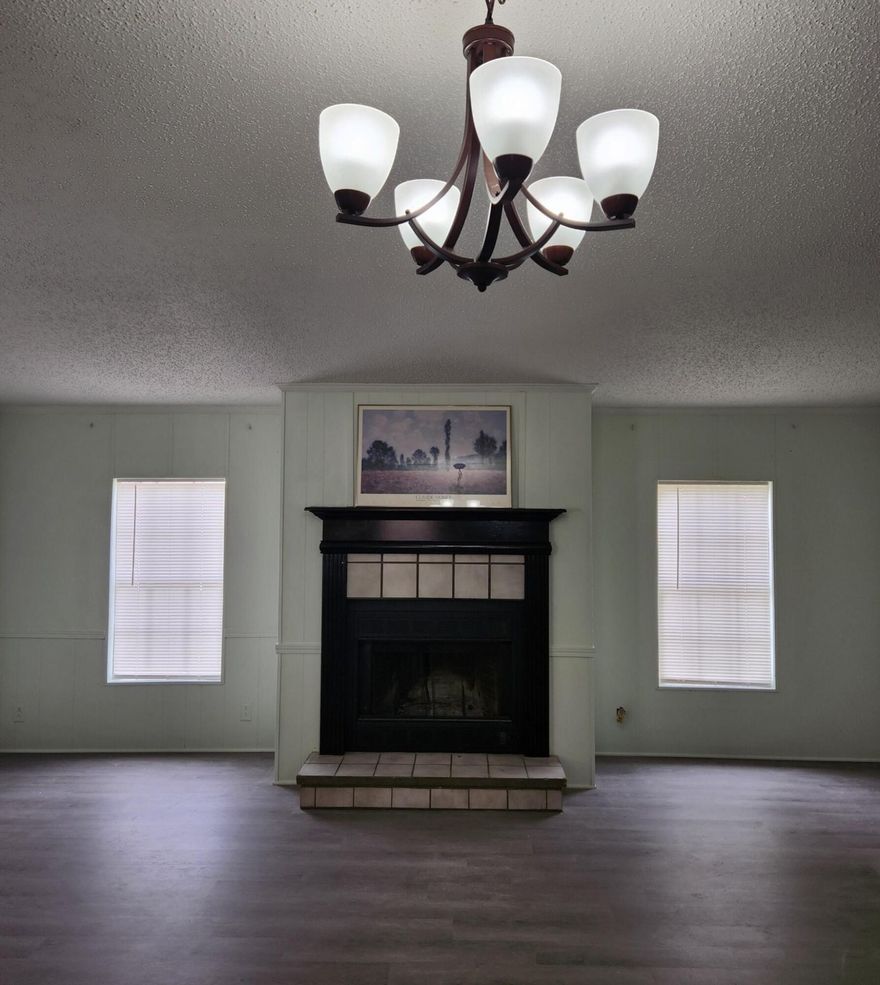 MOVE IN READY!!! Beautiful Remodel.NEW ROOF< SOME NEW Cabinets, NEW flooring, NEW Paint, NEW SINKS< NEW faucets, NEW Front porch, so many improvements. This is the one to see. $50,000.00 down, seller financing available.