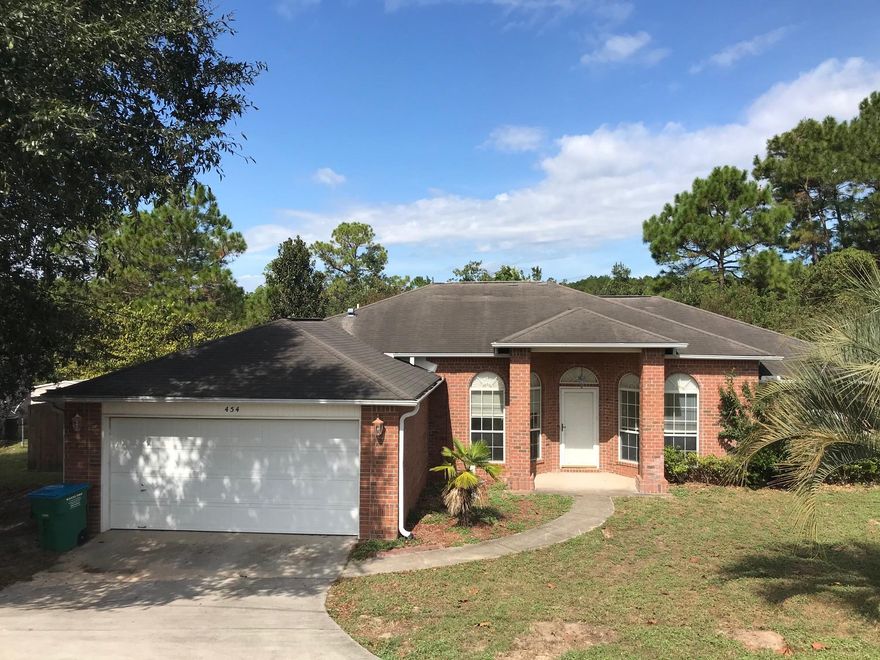 Beautiful 4 bedroom 2 bath home for sale in Crestview! This property features a two car garage, large open living room with vaulted ceilings and plant ledges, patio off of living room, formal dining room, and a breakfast nook. Large kitchen with island. Indoor laundry room. Spacious master. Split floor plan for added privacy. This property is vacant and easy to show.