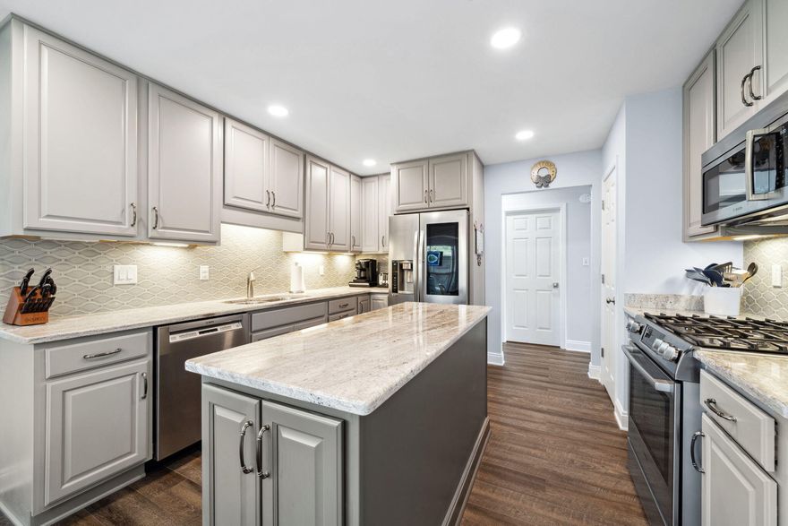**Reduced Price, Motivated Seller!!**  5-BEDROOM  GATED PARKWOOD COMMUNITY  NEAR EGLIN AFB  A+ SCHOOLS  REMODELED KITCHEN  2025 ROOF & WATER HEATER  WORKSHOP W/ POWER  ROOM FOR A POOL, Beautiful 5-BEDROOM, 3 BATH home in the GATED COMMUNITY of PARKWOOD ESTATES and see why it's one of Niceville's most sought-after neighborhoods! Just MINUTES FROM EGLIN AFB and walking distance to top-rated Bluewater Elementary, this 2,537 SF home features a FULLY REMODELED KITCHEN with Bosch gas stove and convection oven, all-new appliances, and stylish new LVP flooring, REMOTE CONTROL GAS FIREPLACE on the first floor. SPLIT BEDROOM PLAN. 1st Floor- primary and 2 additional bedrooms and 2 bathrooms. Upstairs you'll find fresh carpet and 2 spacious bedrooms, 1 bathroom plus loft area.