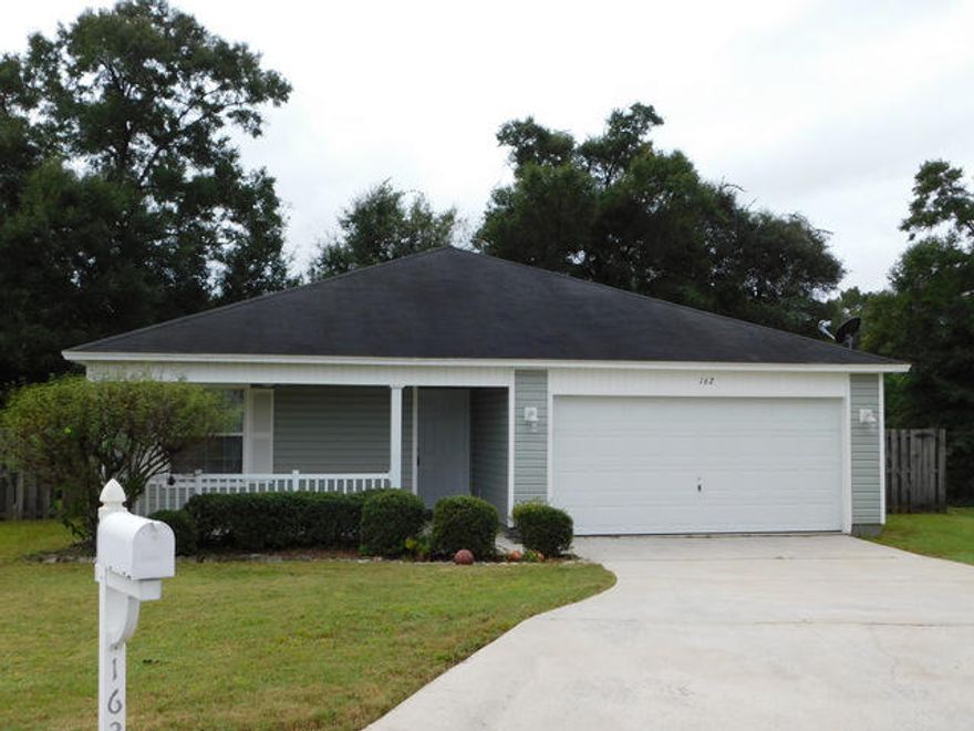 4 Bedrooms/ 2 bathrooms! Nicely renovated 4 bedroom home with a 2 car garage. New wood laminate floors, newly painted walls and cabinets. This house is very clean and '' turn key'' ready to occupy or purchase as an investment property. This home has a great rental history but also would make for a great starter or retirement type home. With 4 bedrooms laid out in a split floor plan, the 4th bedroom is large and it would also serve as an office or media room. This home is well appointed and ready for a new owner. The home is located back off of the road in a curve and has the woods out back for privacy from the wood deck and wood privacy fencing in the rear of the home. Come by and take a look at this home before it is SOLD!