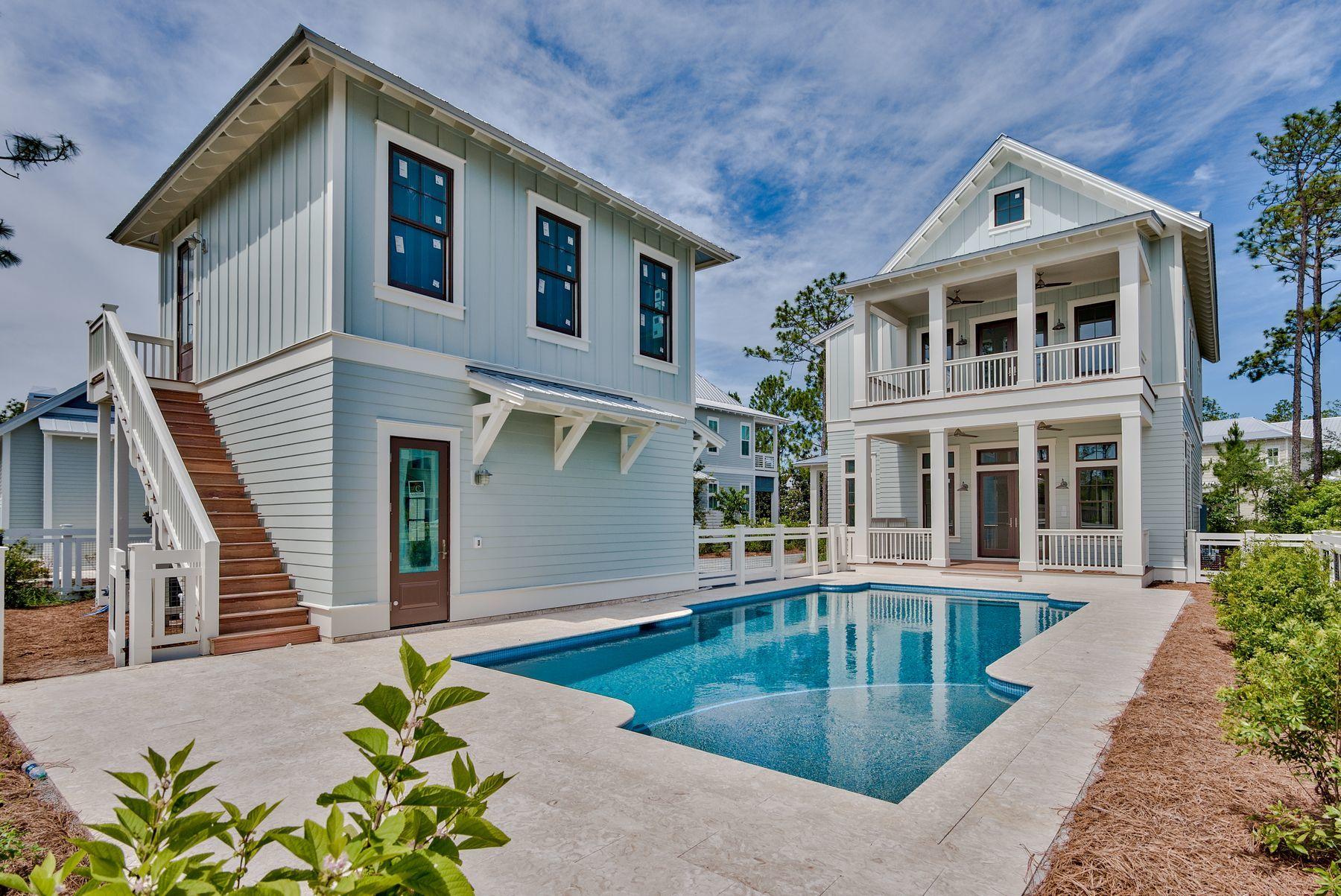 Exemplary new construction characterized by coastal charm offering prominent positioning with unparalleled privacy within the heart of Watercolor Phase IV. This masterfully built residence graciously yields over 3,800 sqft of pristine living space spanning an impressive three-story vertical footprint allowing for sweeping vistas and ample room for entertaining. Exceptional investment opportunity abounds with over $140,000 in projected gross annual rental revenue. This 6 bedroom 6.5 bath home epitomizes 30A living, highlighted by a resort amenity package including one of the largest residential pools in Watercolor as well as a coveted guest house and oversized two-car garage.