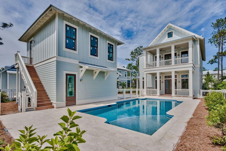 Exemplary new construction characterized by coastal charm offering prominent positioning with unparalleled privacy within the heart of Watercolor Phase IV. This masterfully built residence graciously yields over 3,800 sqft of pristine living space spanning an impressive three-story vertical footprint allowing for sweeping vistas and ample room for entertaining. Exceptional investment opportunity abounds with over $140,000 in projected gross annual rental revenue. This 6 bedroom 6.5 bath home epitomizes 30A living, highlighted by a resort amenity package including one of the largest residential pools in Watercolor as well as a coveted guest house and oversized two-car garage.