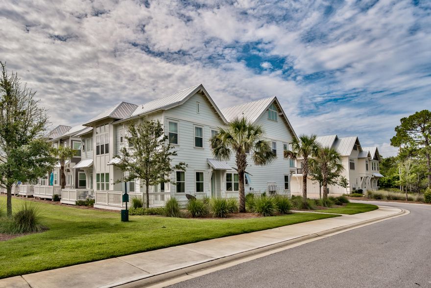 Truly a beach retreat that has it all, this 3 bedroom/2 bathroom townhome in Prominence exudes luxury and convenience. Supremely located within Prominence, bordering the state park, privacy is one of the many luxuries of this home. This home is outfitted with every upgrade. There are premium hardwood floors and tile throughout, plantation shutters, granite counter tops, and upgraded light fixtures, just to name a few! It is also beautifully appointed with Restoration Hardware furnishings and decor.
The first floor features a lovely open floor plan with a living, dining, and kitchen area providing comfort and ample space for entertaining. French doors off of the living area open to a porch that overlooks a large greenspace as well as the state park.
Upstairs you will find a spacious master suite, with an en suite bath, as well as two guest bedrooms and one additional full bathroom. 
 The community of Prominence boasts amenities including a luxurious resort style pool, a state of the art fitness center, and a private shuttle providing transportation to the beach.  Another wonderful feature of this community is it's town center, The Hub, located just across the street!  Full of restaurants, shops, an amphitheater and activities galore, there is truly something for everyone.
This fabulous home would make a great choice for a personal beach getaway or rental investment.   Don't miss out on the opportunity to own a perfect beach home in a wonderful community!