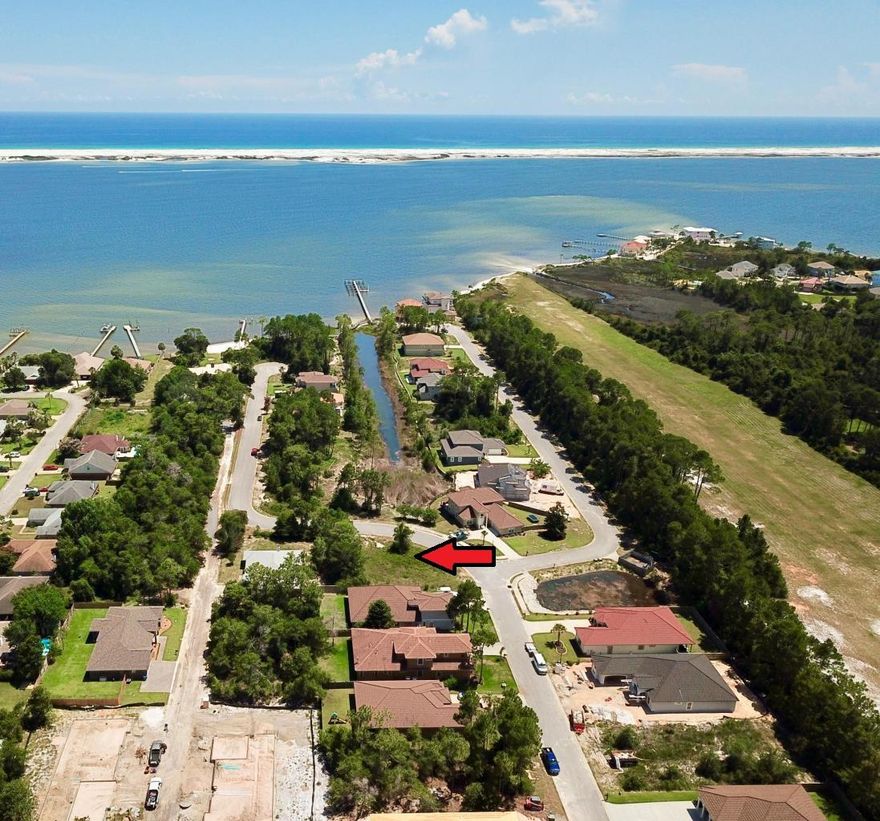 Looking for an exclusive, gated waterfront neighborhood to build your dream home?Here it is! Premium interior, corner lot with fantastic views of the Coastal Lake that leads to the Santa Rosa Sound. This 42 lot offers a community boat dock and beach, underground utilities, professional landscaping and gated entry. NO FLOOD INSURANCE REQUIRED. This subdivision is conveniently located to local military bases, shopping, schools and beaches! Buyer to verify all information and dimensions.