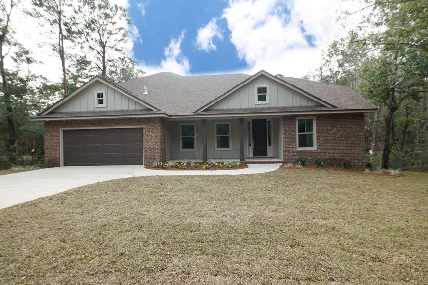 This gorgeous, custom home was designed and built by Gary Miller Homes Inc., a family business with 40+ years experience in custom residential home design and building. The home features an open floor plan showcasing a kitchen, living room, dining room, and breakfast area, as well as four bedrooms and three bathrooms. The kitchen has significant cabinet space, granite counters, stainless appliances, and an oversized breakfast bar to make the most of morning time together. In the primary suite, there is a custom shower, stand alone bathtub,  Shaker style double vanities and walk-in closets. There are two bedrooms and a bathroom upstairs, and the fourth bedroom and full bath are on the main level overlooking the backyard.