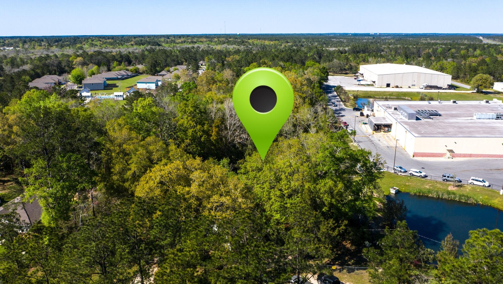 HOME ON 4 ACRES LOT, in the heart of Freeport, Florida. This property has so much potential!!! Live on 4 acres lot or Plat theproperty and sell the house building for professional office use, such as, chiropractor, dentist, pediatrician, etc.., then develop the remainder lot or subdivide andsell separately. Electricity, phone, cable, internet, public sewer and water are available for this property. Home is on well and septic. Please keep in mind whenputting an offer that the main value of this property is on the land. The house is habitable, but would need renovation.
