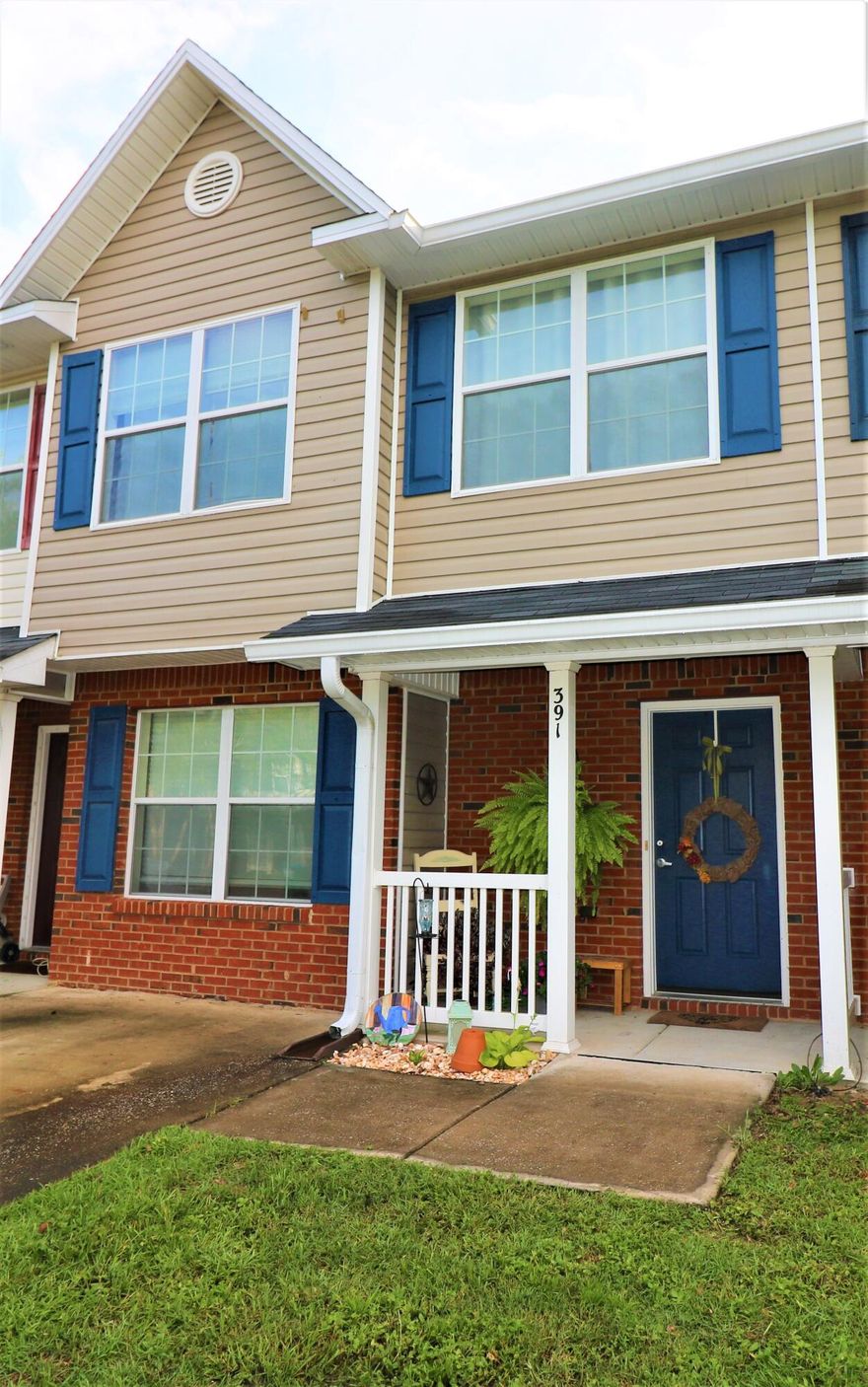 Affordable, gorgeous, and move-in ready! From the cozy front porch to the back yard oasis, and everything in between, you are going to love this updated townhome with bells and whistles galore. Enter to take in the current owner's pride in ownership. This home has been lovingly and stylishly maintained. NEW and NEWISH: high end vinyl plank flooring in downstairs, kitchen subway tile, modern appeal white painted kitchen cabinets on top and light olive on the bottom, ceiling fans in living room and master bedroom, light fixtures downstairs, downstairs blinds, HVAC, water heater, fence in back yard, and roof. Downstairs features a separate dining room, bright updated kitchen and living room, and a 1/2 bath. Upstairs is the large master suite with full bath, 2 more bedrooms, and a guest bath. You will want to spend a lot of time in the fenced-in backyard as the patio is covered with 2 modern tarps and has a concrete pavered area for your patio furniture and entertaining. The seller is gifting to the new owner: the patio tarps, pole planters that support the tarps, washer, and dryer. The location is prime as it is a short distance to the beautiful beaches of the Emerald Coast, shopping, dining, medical facilities, and Interstate 10. 