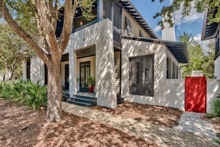72 hour kick out clause in place. If you get a sense of dj vu from this property, you could be right. This artfully designed home by Tim McNamara was featured on the pages of Coastal Living magazine. Located on a large corner lot, this lovely home has green views across the street in the shady greenery of a pocket park. This rather special home in Rosemary Beach has an open floor plan with lots of light thanks to the adjoining side porches. Open the multiple sets of French doors and appreciate the bonus outdoor living space complete with dining area. The cozy outdoor fireplace casts a rosy glow of warmth for evening sundowners or casual entertaining. More formal dining can be enjoyed beneath the contemporary chandelier with food inspired by the zesty contemporary kitchen.