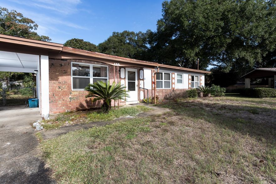 This home is located on a cul de sac in a no through street neighborhood! The backyard is enormous, and the house has four decent sized bedrooms. The master is split off from the other three bedrooms and also has its own full bath!