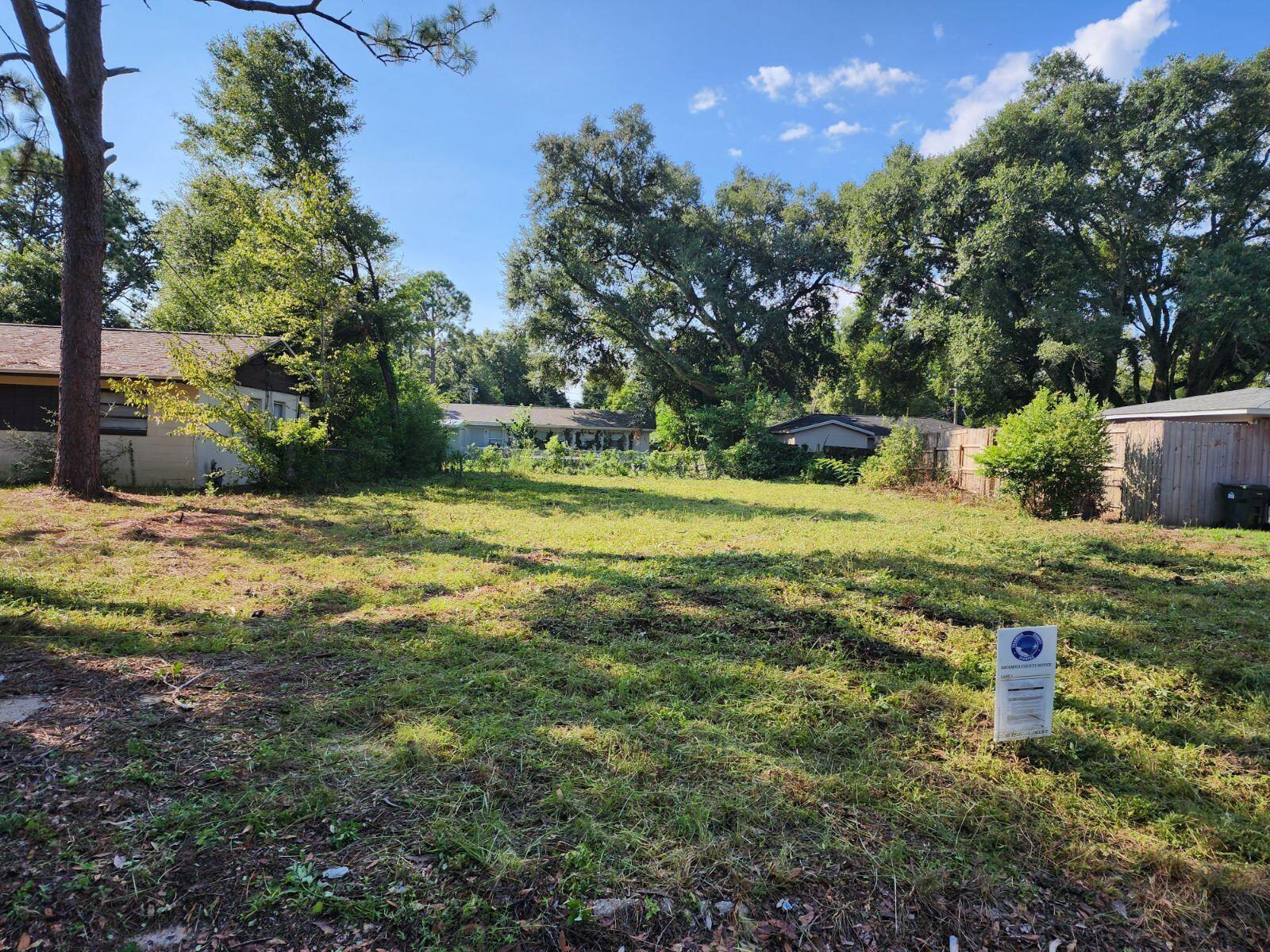Fantastic lot for you to build your dream home! Trees have been removed since seller purchased - photo is current. More photos coming soon. Water, sewer, electric all available on street.