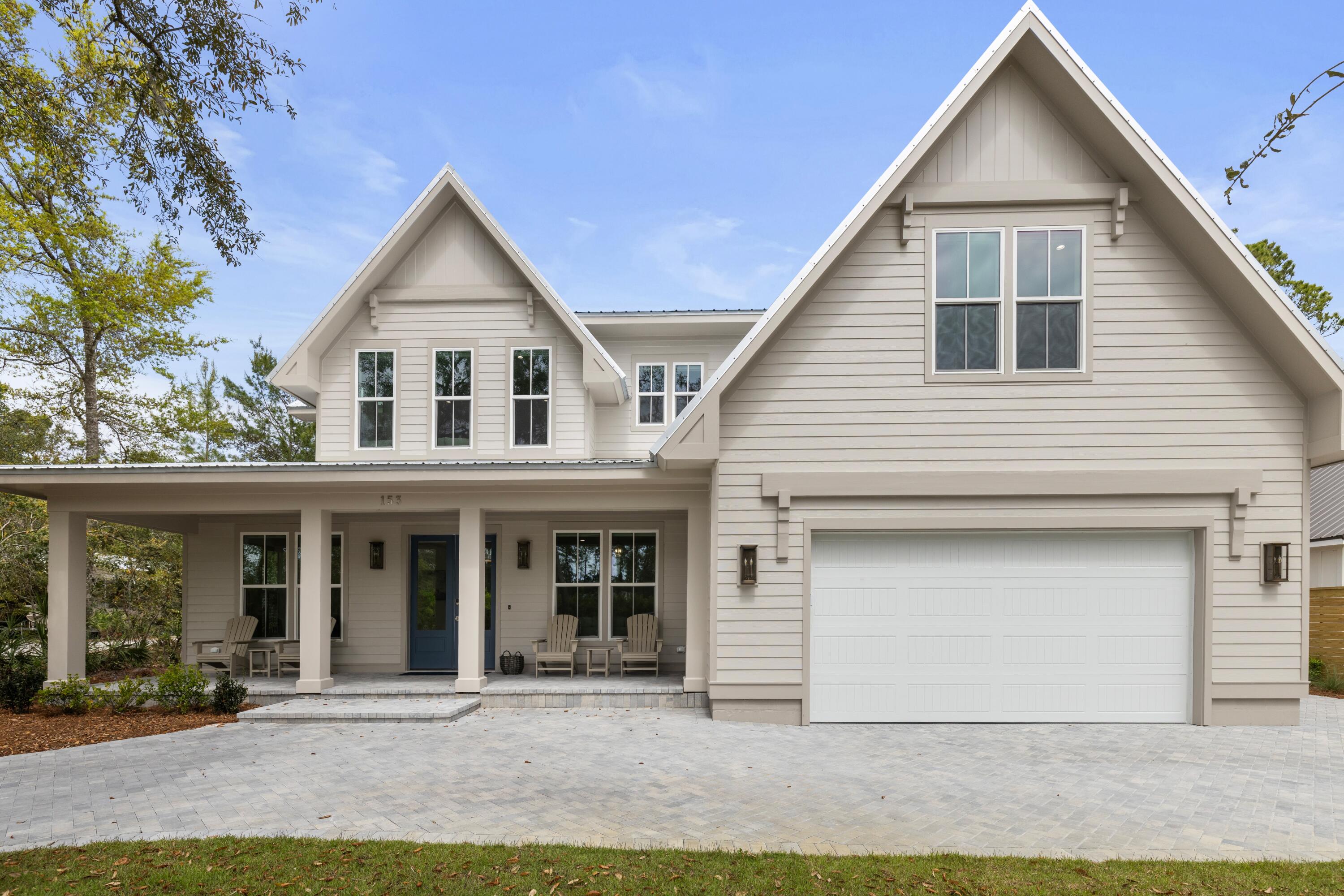 Experience elevated coastal living in this fully furnished new construction home offering 4,030 square feet of refined design and luxurious detail. This 5-bedroom, 4.5-bath residence features a screened-in pool and hot tub, brick paver driveways and patio, and is ideally located just behind The Bay! Best of all, only one minute from the boat ramp and ten minutes from public beach access. The gourmet kitchen showcases custom cabinetry, Taj Mahal countertops, Cafe gas appliances, and flows seamlessly into a spacious open living area perfect for entertaining. Additional highlights include a wine cellar, game room, integrated internet booster system, high-impact windows and doors, and designer finishes throughout, including ceramic, glass, and marble in the bathrooms. The home is equipped with two Navien tankless water heaters running in tandem with a hot water loop, Electrolux washer and dryer, a well-fed irrigation system, underground stormwater drainage, and a Ninja floor system in the garage. To the right of the home you will find plenty of space for your RV and boat! Designed for both full-time living and short-term rental, this turnkey property combines elegance, comfort, and investment potential in one exceptional package.