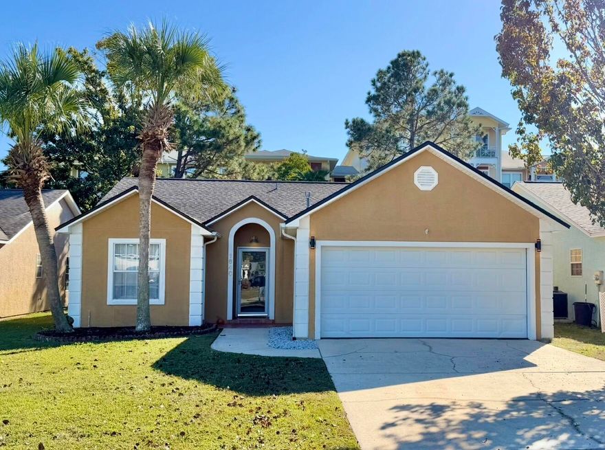 Live the Panama City Beach lifestyle just minutes from the sand and Pier Park! This beautifully updated 2BR/2BA home shines with thoughtful upgrades. Enjoy a bright open layout with new flooring, crown molding, stylish lighting, and a remodeled primary bath with a walk-in shower and modern finishes. The kitchen features freshly painted cabinets, updated hardware, and a new range hood. Step outside to a screened porch overlooking a fenced backyard, and a front yard with irrigation. The garage is a showstopper - epoxy floors, new lighting, and a wall storage system. With paid-off solar, a prepaid termite bond, and home warranty through summer 2026, this move-in ready home is perfect as a primary residence, beach retreat, or to invest in as a short term rental. And no flood zone!