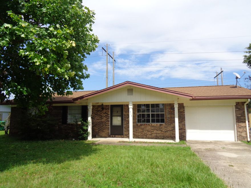 Beautiful 3 bedroom 2 bath in desirable Fort Walton. This property features new hand scraped engineered hardwood floors throughout, travertine in the kitchen and master bath, and a one car garage. Livinf room opend up to the dining area, and there is a large bonus room/den off of the dining area. Double doors with built in blinds in den lead to large fenced in back yard with open patio. Kitchen has been nicely updated with beautiful cabinetry and stainless steel appliances. Master bathroom has also been updated, and features a custom walk-in shower. House right next door is also for sale, view both!