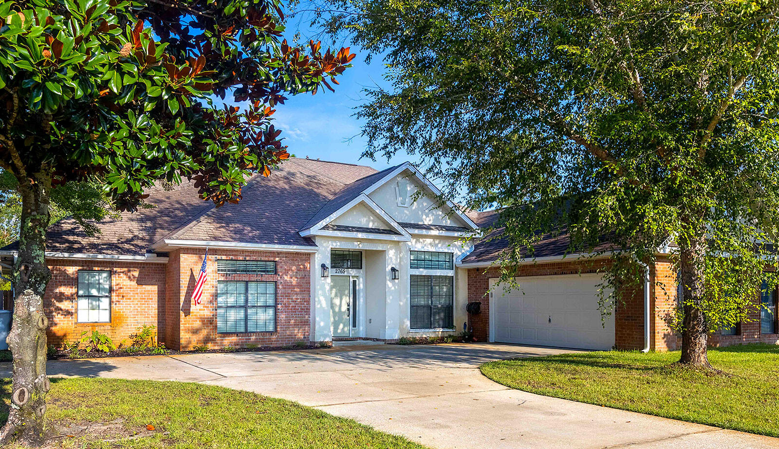 Impressive custom designed 3 bed, 3 bath home with an additional office and dining room in Grand Bay Estates. Exceptional floor plan has a grand foyer with 11' ceilings, wood floors and fresh paint throughout the home, formal dining room & office, Spanish lace walls & ceilings, high arches, plant ledges and crown molding. Fantastic kitchen has luxurious granite counter tops with upgraded cabinets, island and large breakfast bar. The great room with fire place leads to a private fenced yard with an extra large patio, and still has room for a pool. Master suite includes walk-in closet, garden tub and dual vanity.Grand Bay Estates is an exclusive waterfront community with sidewalks, street lamps, underground utilities, and waterfront deeded access to the nieghborhood pier.