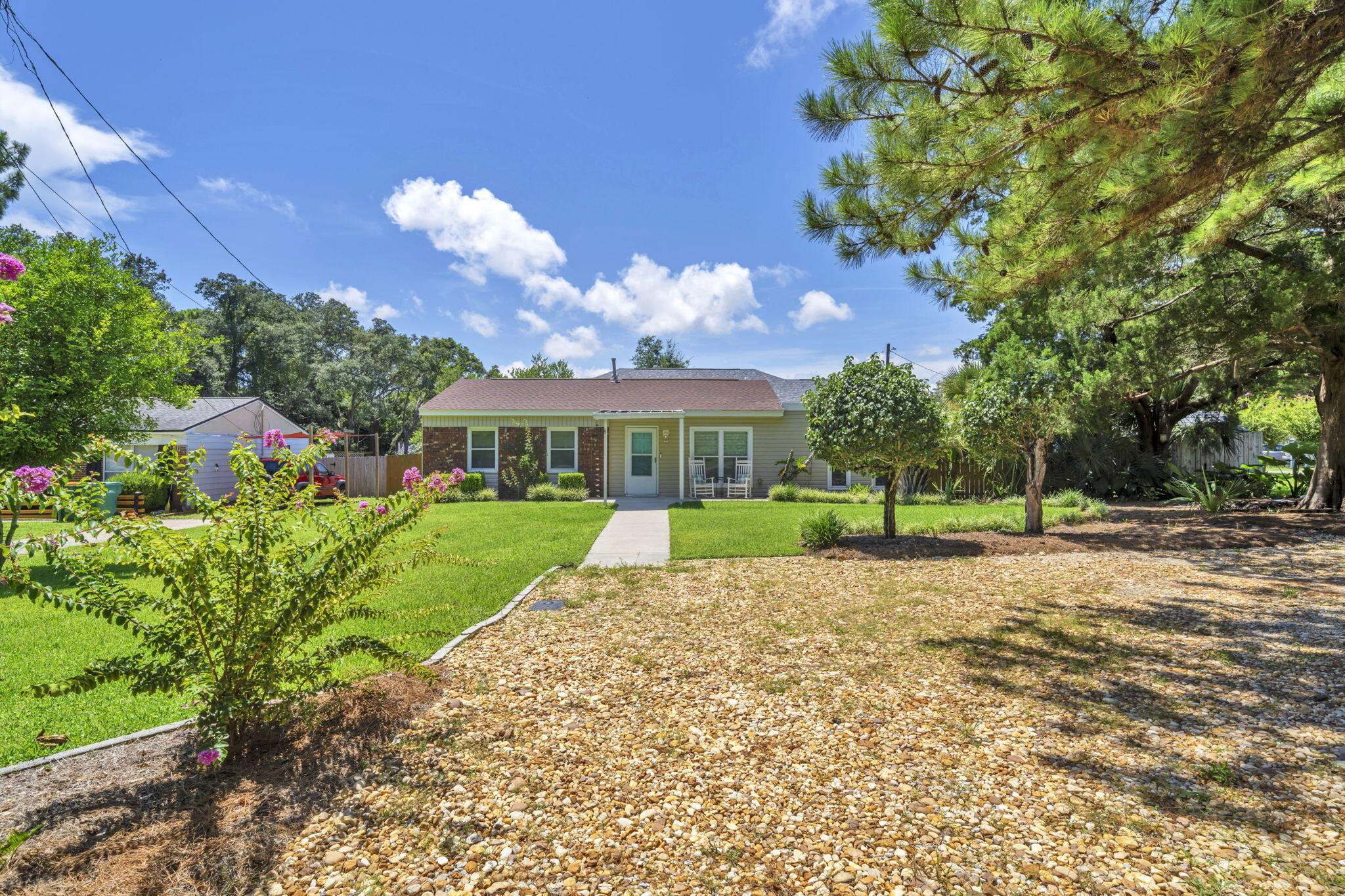 Updated home in Shalimar, FL with xx sq feet and 3 bedrooms and 2 baths! No HOA, no flood insurance required, boat trailer and RV parking, and a fully renovated home! The location of this home is very convenient with only a few minutes to the white sandy beaches of the Gulf and the military bases! Enter the home into the open floor plan, with the living room opening to the eat in kitchen area and the fully renovated kitchen. The updates include white shaker cabinetry, quartz counter tops, tiled back splash, slide in stainless and black stove, a side by side stainless refrigerator with ice maker, an undermount sink, a stainless dishwasher, and brushed nickel hardware and faucet! The home features tile and luxury vinyl plank flooring, new interior paint, new lighting, and blinds. In addition, the doors have been updated to raised panel doors. The home also features a split floor plan with 2 bedrooms and a full bath on one side and the bonus room and full bath on the opposite side! The bonus room features a gas fireplace, a walk in closet, and full bathroom. The bathrooms have also been updated to feature new vanities, faucet and fixtures! The hall bathroom has a tub and shower combination and the 2nd full bath has a walk in shower. The bathrooms also have new vanity lighting and mirrors. This home comes with a stackable washer and dryer! Enjoy the covered back patio that has wiring for a flat screen TV or the open, paver patio. The paver patio is perfect for a hot tub or RV spot! There is a small shed and a workshop for ample storage! Palm trees abound on this lot! There is a double gate to enter into the back courtyard! Back your boat behind the fence! The shingled roof is 2017 year, the water heater is approximately 3 years old and the HVAC is 2017. Buyer to verify all dimensions and information.