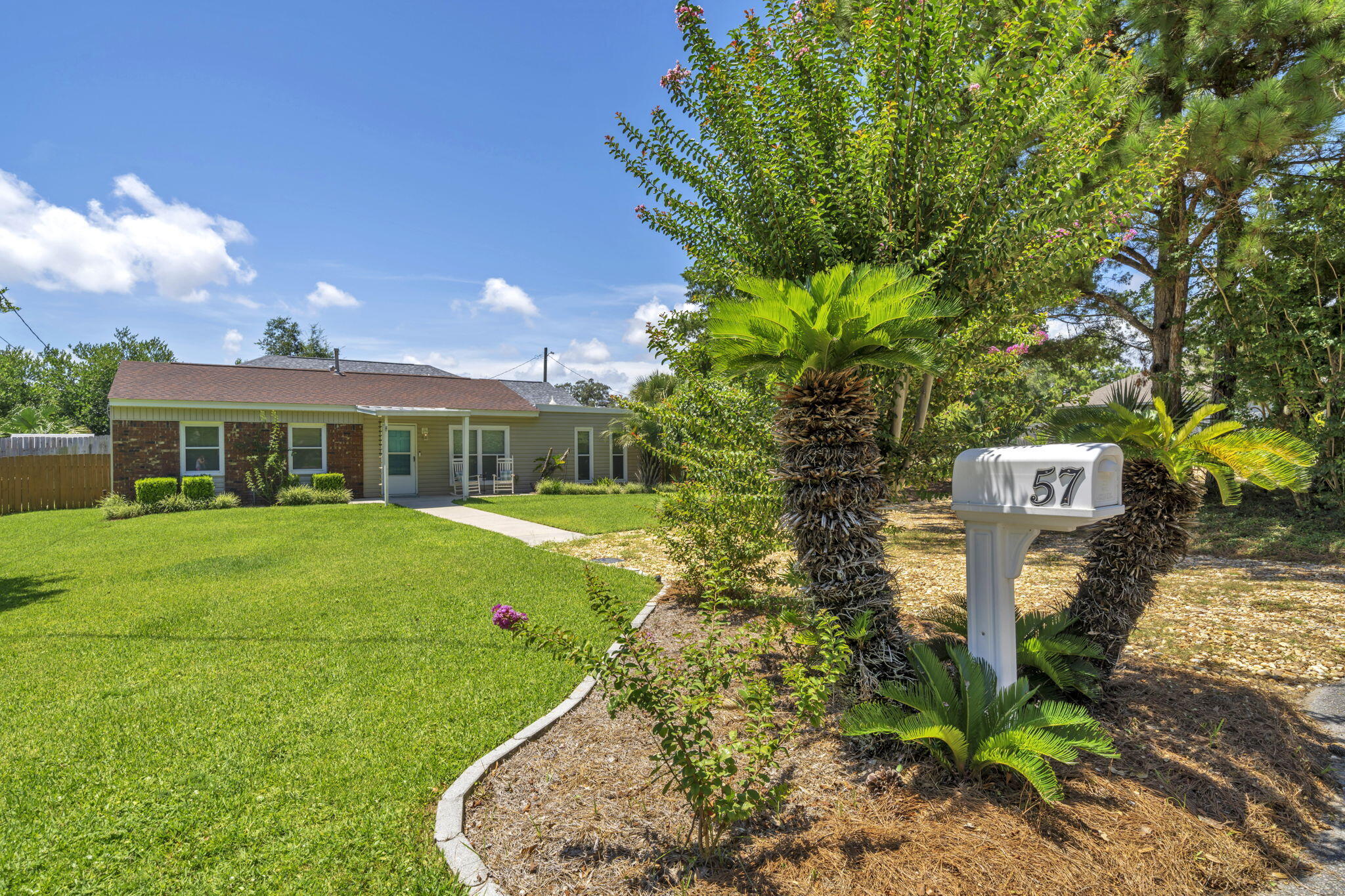 Updated home in Shalimar, FL with xx sq feet and 4 bedrooms and 2 baths! No HOA, no flood insurance required, boat trailer and RV parking, and a fully renovated home! The location of this home is very convenient with only a few minutes to the white sandy beaches of the Gulf and the military bases! Enter the home into the open floor plan, with the living room opening to the eat in kitchen area and the fully renovated kitchen. The updates include white shaker cabinetry, quartz counter tops, tiled back splash, slide in stainless and black stove, a side by side stainless refrigerator with ice maker, an undermount sink, a stainless dishwasher, and brushed nickel hardware and faucet! The home features tile and luxury vinyl plank flooring, new interior paint, new lighting, and blinds. In addition, the doors have been updated to raised panel doors. The home also features a split floor plan with 3 bedrooms and a full bath on one side and the bonus room and full bath on the opposite side! The bonus room features a gas fireplace, a walk in closet, and full bathroom. The bathrooms have also been updated to feature new vanities, faucet and fixtures! The hall bathroom has a tub and shower combination and the 2nd full bath has a walk in shower. The bathrooms also have new vanity lighting and mirrors. This home comes with a stackable washer and dryer! Enjoy the covered back patio that has wiring for a flat screen TV or the open, paver patio. The paver patio is perfect for a hot tub or RV spot! There is a small shed and a workshop for ample storage! Palm trees abound on this lot! There is a double gate to enter into the back courtyard! Back your boat behind the fence! The shingled roof is 2017 year, the water heater is approximately 3 years old and the HVAC is 2017. Buyer to verify all dimensions and information.