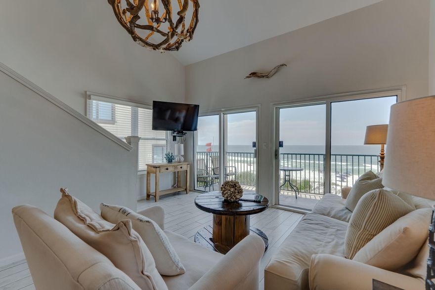 This is a must-see top floor end-unit. Windancer is  a hidden gem located right on the beach! Only 4 stories with a total of 48 units in the whole building! Private beach access and a Gulf front heated Pool. These condos do not come up often and are higly sought after rentals.  Master Bedroom is located on the first floor with two additional guest rooms upstairs.This two-story unit sleeps 10.: Wood-Plank tile floors, Granite counters, stainless steel appliances, renovated/closed off loft to create a private bedroom, lots of natural light and views provided from windows only found 
on the end condos.