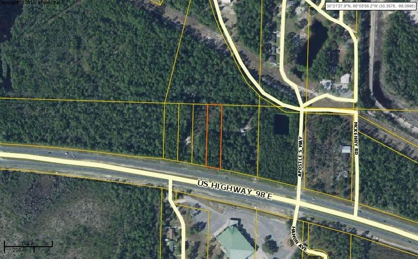 Vacant VILLAGE MIXED USE property with 101 ft road frontage on US Hwy 98. Across the street from the Christian International Church and approx. 1 mile east of the new Emerald Coast Middle School and Peach Creek subdivision. It is approximately 3.5 miles north of the beach and Hwy 30-A. Six miles west of Watersound North and Camp Creek subdivisions, where several golf courses, shopping, and thousands of new homes are located. Property is zoned Village Mixed Use. VMU allows for a wide variety of uses, including General Commercial, Public, Civic, Entertainment and recreation, and VMU limited lodging. Wetlands are located on the property