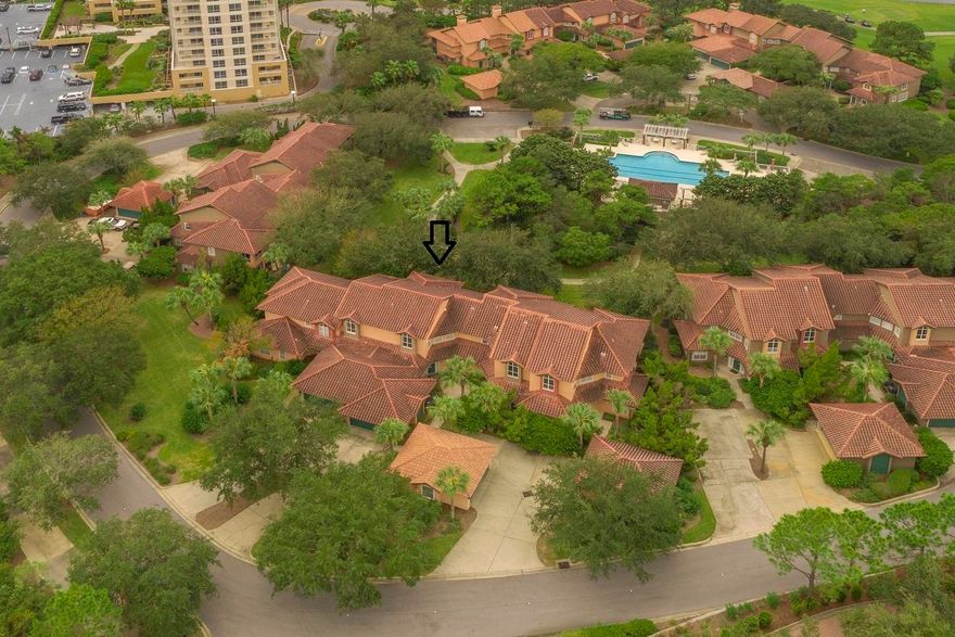 This fantastic 3/3.5 townhouse is where Mediterranean elegance and leisure come together! The open floor plan is great for entertaining or relaxing & offers crown molding with ceramic tile downstairs, kitchen with granite counter tops & stainless appliances, large living area & guest bedroom with en suite bath offering patio access from both. Upstairs the master bedroom suite has balcony access, walk-in closet, en suite bathroom with double vanity, large tub, & separate walk-in shower. Another guest bedroom and bathroom complete the second level.  A screened balcony and covered patio provide wonderful outdoor spaces for your enjoyment.  Both HVAC's new as well as hot water heater. ($15,000) TV's and ,master bed replaced in the last year. ($6000) And it conveys fully furnished and rental