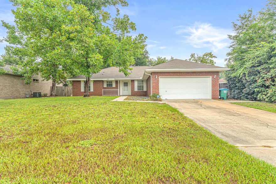 FRESHLY PAINTED!!! This all brick home is ready for YOU!!! Conveniently located on the south side of Crestview close to hospital, shopping, I-10, Special Forces compound, Duke Field, & Eglin AFB. Enter into the spacious living room & notice the hardwood floors & cathedral ceiling. Kitchen has a breakfast bar, pantry, gas stove & plenty of cabinets. Kitchen, laundry, & bathrooms have tile flooring. Home has a split bedroom floor plan with no carpet. Master bathroom has a single vanity, two walk in closets & a tub/shower. Home also has a screened porch & workshop! Backyard is privacy fenced. Roof + AC unit were replaced in 2010. 1 Year Basic Home Warranty included for Buyer's peace of mind. Buyer to verify for themselves all measurements & information deemed important.