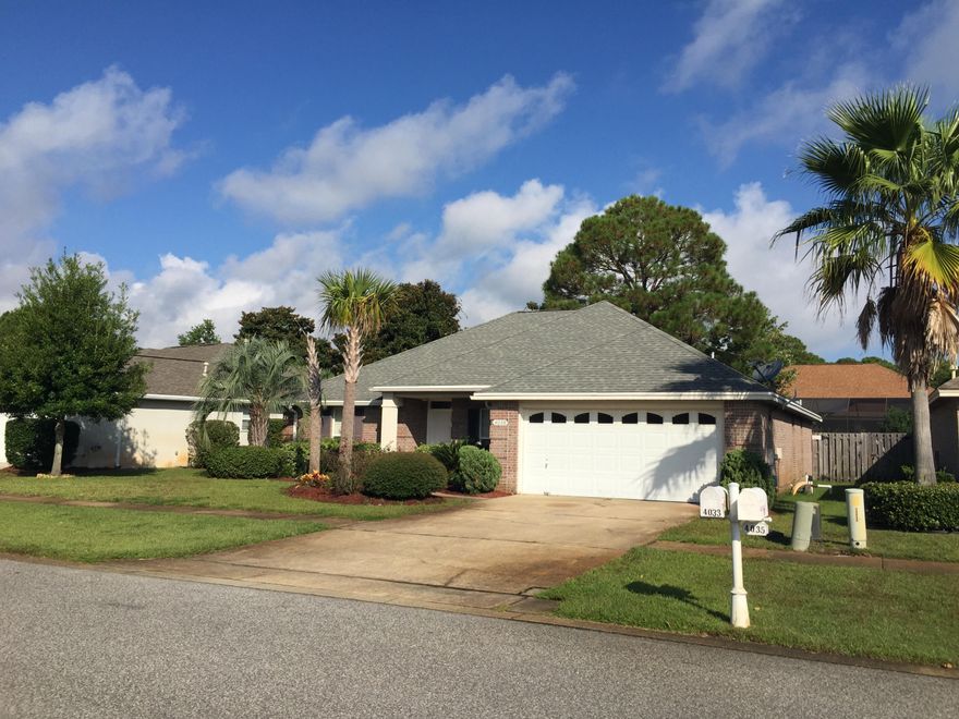 Brand new flooring installed. One owner home in Indian Lake subdivision priced to sell. Open floor plan, light and bright kitchen with tile flooring and crown molding on cabinets, covered patio leading to large fenced back yard and more. Location is close to everything Destin has to offer.