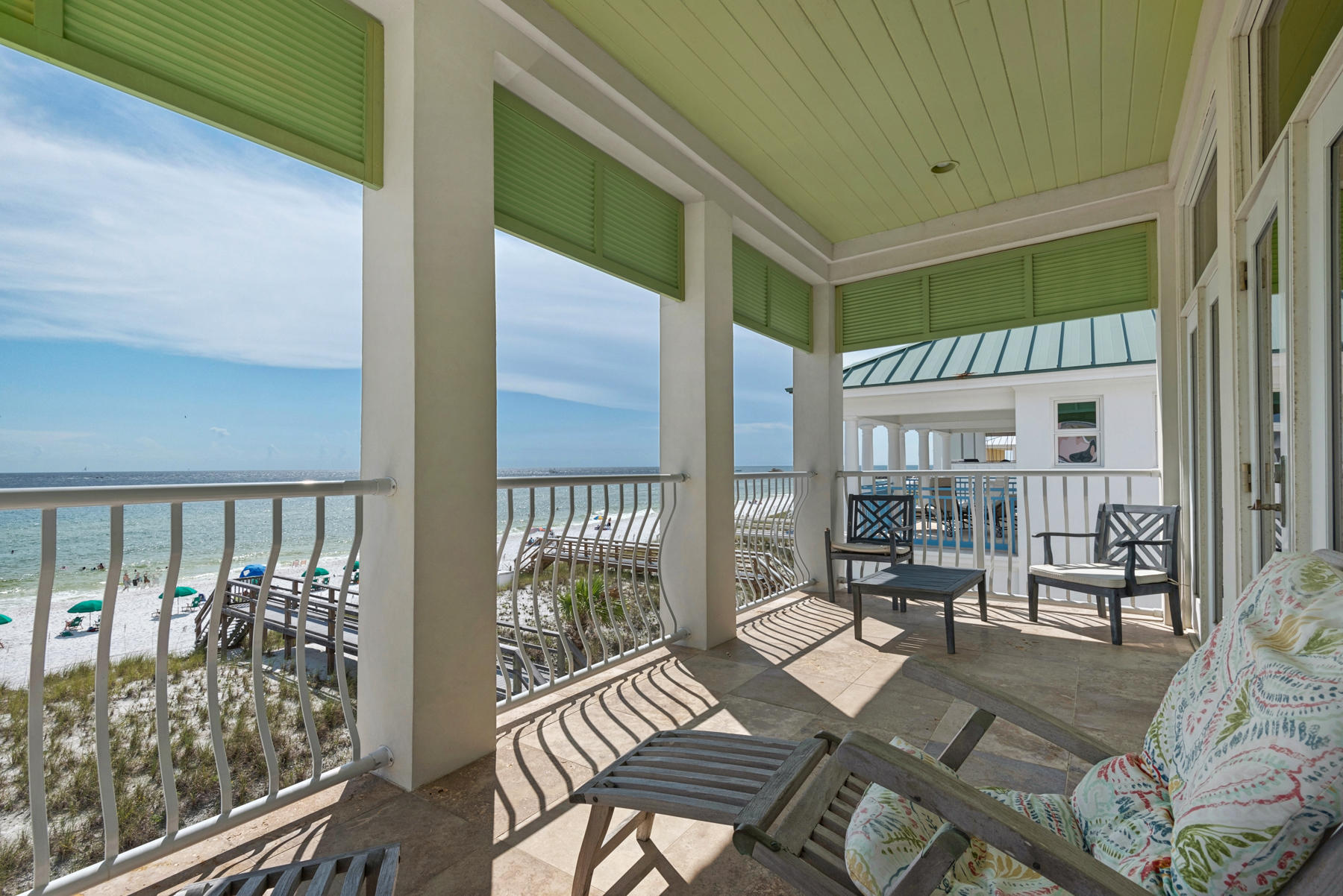 Experience the finest of beach living in this up-to-date, 3-story, Gulf-front beach home located on a private stretch of coastline in Holiday Isle's gated Destin Pointe community. This popular vacation rental produces $170K in annual gross income. ''Gulf Landing'' enjoys incomparable views of 3 bodies of water: the Gulf of Mexico, Destin's East Pass, and a coastal dune lake. Two full size kitchens and living areas distinguish this 3,101 sq. ft. home. Emerald green waters punctuate the neutral color scheme, while floor-to-ceiling windows allow natural light to reach deep within the interior. The main kitchen is an epicurean delight with Sub Zero refrigerator, Thermador appliances, double oven, warming drawer, custom cabinetry, granite counters, wine storage, wine cooler, and ample workspace The generously sized master suite features a private balcony, morning kitchen with sink and beverage center and a luxury en suite with double vanities, spa tub, and walk-in steam shower. A 1st-floor guest suite with full-size kitchen and living area is designed to accommodate large groups of friends and family. In addition, this home features plenty of storage, 2 laundry facilities, travertine floors, deep balconies, and more. Destin Pointe, a gated ''island community'' on Holiday Isle, offers 3,000 feet of beaches, tennis, 2 pools, 2 lakes, gazebos, protected wildlife areas, and a beach club.
