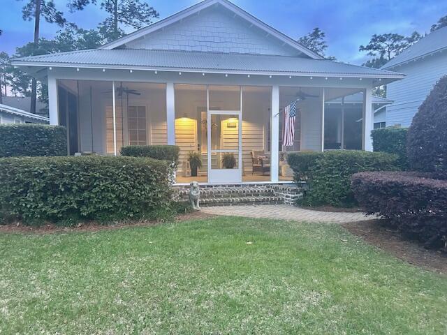 Welcome to this charming Florida-style cottage in the desirable Carson Oaks neighborhood! The front of the home features a screened-in porch complete with a comfy sofa swing and ceiling fans. Ideal for early morning lounging or al fresco entertaining. Recently painted inside and out, this 3-bedroom, 2-bath home offers single-level living at its best. The open-concept great room is complete with a gas fireplace and a newly installed custom bookcase. Kitchen has stainless steel appliances, farmhouse sink, granite countertops and under cabinet lighting. The Master features an en suite with spacious walk-in closet. A back door and large deck with pergola have recently been installed off the Master bedroom creating a private oasis and easy access to fenced backyard. The other two guest bedrooms share a bath which is en suite to one of the bedrooms. Beautiful LVP has been installed in all bedrooms. New Air Conditioning unit installed April 2025!!! Carport and adjacent storage area should not be overlooked. Carson Oaks features a lovely community pool and new pickleball court. Homeownership includes access to community pavillion, boat launch and boat storage directly off Mack Bayou. Do not miss this well-constructed Huff Home located in rental restricted Carson Oaks. Neighborhood is convenient to Sandestin, Grand Boulevard and 30A!