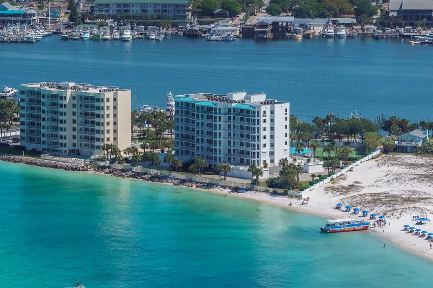 Beachfront? Check! Boat slip included with the sale, and located right across the street? Check! TWO outdoor balconies the size of two small car lots? CHECK! Views of the East Pass, the Gulf, and Destin Harbor? Well, yes, that too! This wasn't named The ULTIMATE Condo building for nothing. It was meant to provide its owners with their ultimate beach life experience. Life here is also enhanced with a pool, tennis court, club house, sauna, and workout facility. The resort is gated for additional privacy, and located near the end of Holiday Isle, a dead end road, therefore limiting the amount of traffic and road noise. However, Hwy 98 is only 1.8 miles away, opening up all the fun Destin has to offer from helicopter rides to tons of restaurants. Live your Ultimate Life here at The Ultimate!