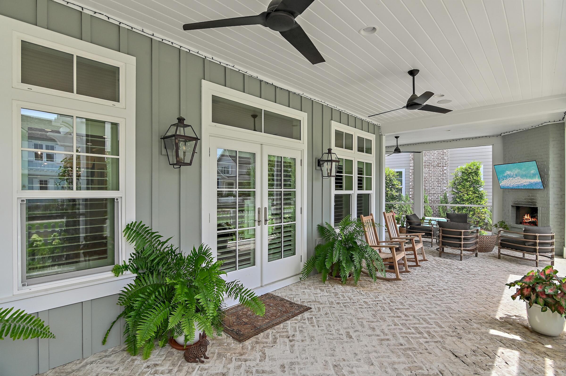 Outdoor Fireplace! Welcome to 262 Lantern Lane! This Southern-style inspired home, constructed in 2020, is nestled in Regatta Bay Preserve--a boutique neighborhood of only 21 lots w/in the gated golf community of Regatta Bay. The Savannah floor plan features 3,290 sq. ft. of heated & cooled living space, 4 bedrooms, 4.5 baths, and a 2nd-level flex space. The 1st floor boasts an open layout w/ a combined dining & living area, a gourmet kitchen equipped w/ top-of-the-line stainless appliances, quartzite counters, a center island, breakfast bar, and spacious walk-in pantry. The master suite includes an enormous walk-in closet and a master bathroom w/ dual vanity, a large garden tub, and a sizeable custom-tiled shower. Additionally, there is a guest half bath on the 1st floor. Click ''more'' The outdoor living area features a spacious screened wrap-around brick porch, a gas fireplace, a summer kitchen, and a private pool. The second floor houses a spacious flex area and three guest bedrooms, each featuring a private bathroom. One of these bedrooms can be regarded as a second master suite, given its generous size and exclusive balcony. Be sure to appreciate the exquisite designer details found in Savannah! These include wood flooring, custom solid wood cabinets and shelves, quartzite countertops, shiplap accent walls, brick flooring, a custom wet bar, and custom lighting fixtures. Legendary Home Builders constructs homes using the latest technology and only the highest quality materials and finishes. These include wind and impact-resistant windows, doors, and garage doors; foam spray insulation in the roof for superior energy efficiency; insulation in all interior walls for both energy efficiency and soundproofing; insulation between floors as a sound barrier; gas lanterns; stainless steel door hinges; custom wood shelving in all closets; Kohler plumbing fixtures; KBRS waterproofing systems in all showers for lasting integrity and durability; zoned air conditioning for maximum efficiency; Rinnai tankless water heaters; custom solid wood cabinets with soft-close hinges throughout; customizable smart home technology for homeowners; and LED lighting throughout the entire home. Regatta Bay boasts a blend of architectural styles and resort-like amenities, featuring an award-winning golf course complemented by a Golf Academy, a Country Club with various dining choices, Legendary Marine Boating, a Yacht Club, tennis courts, swimming pools, and jogging paths. It stands out as the sole community in Northwest Florida that combines waterfront living, beaches, golf, boating, and shopping in a single opulent setting.