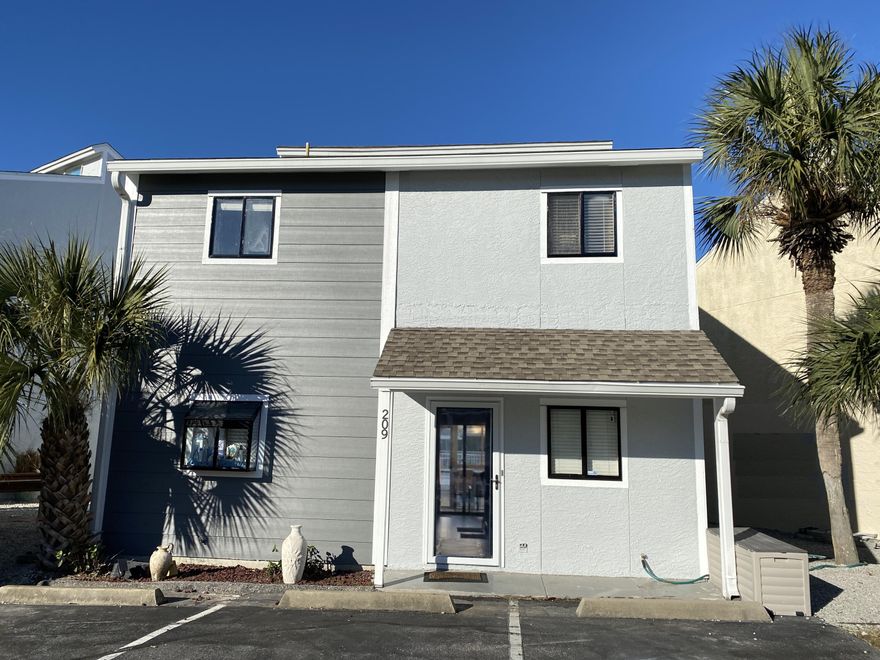 Come see the one and only 3 bedroom Misty Cove Townhome on the market which has undergone an exterior renovation to modern colors/ finishes along with the entire community. Remainder of Community updates including new common area landscaping are projected to be completed by end of March! Captain's Quarters is a sprawling two story layout with an open floor plan that reveals the kitchen, cozy living space, dining area, bathroom, plus washer and dryer all on the first floor. On the second level, you will find 3 bedrooms and a loft area along with two full bathrooms.  Enjoy cool breezes from the second floor screened in patio which is accessed from the main master. Many updates have been done to make this property simply the best including new bunk beds, all new appliances in 2020, new high