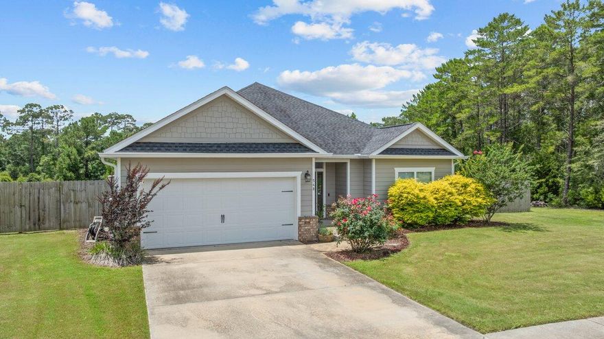 Seller is willing to offer a contribution toward a 2/1 interest rate buy down with acceptable offer up to $9,000. Better than new and meticulously maintained! A Parade of Homes winning builder. Immediately this entry gives a great first impression with lots of natural light & high ceilings. Seamless flow through galley style kitchen. The family room has exaggerated trey ceiling & double crown molding. Exterior door provides access to outdoor living on the large screened rear porch. Large Master BR will be your favorite retreat with crown molding and tray ceiling. Other home features include granite countertops, hard surface flooring, walk in tile shower with separate tub, his/her closets, ceiling fans in all bedrooms, SS appliances, privacy fence with double gates, natural area with no neighbors in the back, whole house pest prevention system, professionally maintained lawn, gutters, and much more