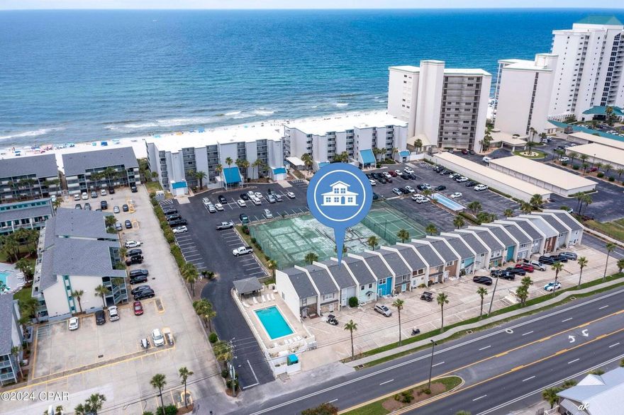 HUGE Price Reduction! Summer Place Townhomes, South of Thomas Drive, on the Gulf side! Often noted as the best part of the beach, quiet, sidewalks, less people, less noise, more sand, sun and relaxing! Featuring 2 bedrooms and 2.5 bathrooms, sleeps 6-10 people with a private balcony and covered porch and ample storage. Kitchen has been updated and overlooks dining and family room. Sit outside on the covered porch and enjoy the salt air and the pool is just steps away for cooling off and washing off the sugar white sand. Private parking, pool, short term rental allowed, many options! Come tour today!