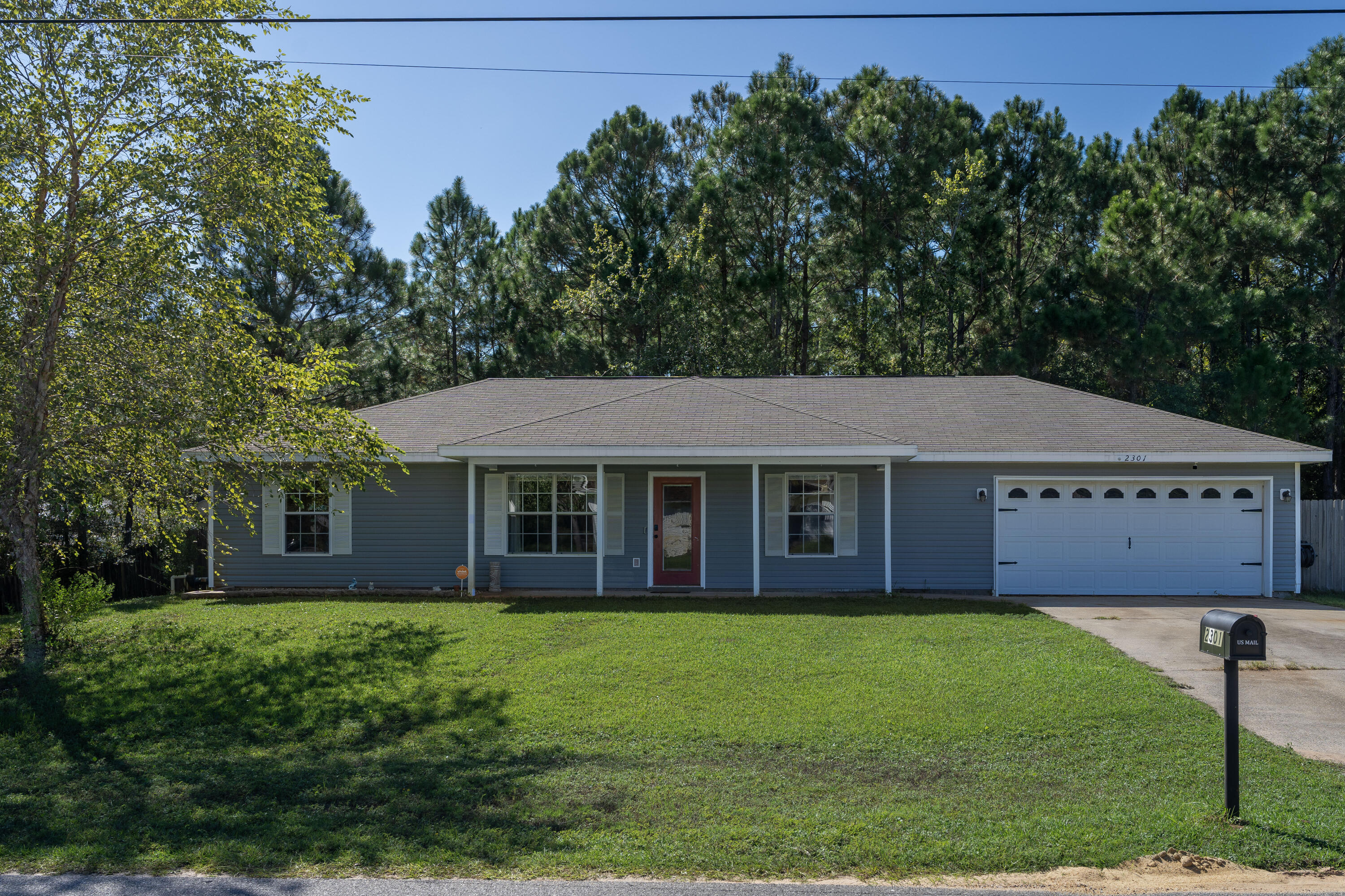 On this 0.46 acre lot, the property extends beyond the new back fence to include a wooded area providing extra privacy. Three bed, two bath with a split floorplan PLUS an office! The main living area boasts vaulted ceilings and new LVP flooring in 2021. The master bedroom has a trey ceiling and both bathrooms received flooring updates as well in 2021 with new tile. Brand NEW roof just installed Oct 3rd 2024! In 2020, the kitchen stove, dishwasher, and microwave were updated to stainless steel appliances. 2024 water heater, 2016 HVAC. Two-car garage with epoxy flooring.  New 2024 back deck and back fence. Back door replaced in July this year. Well pump and working sprinkler system.